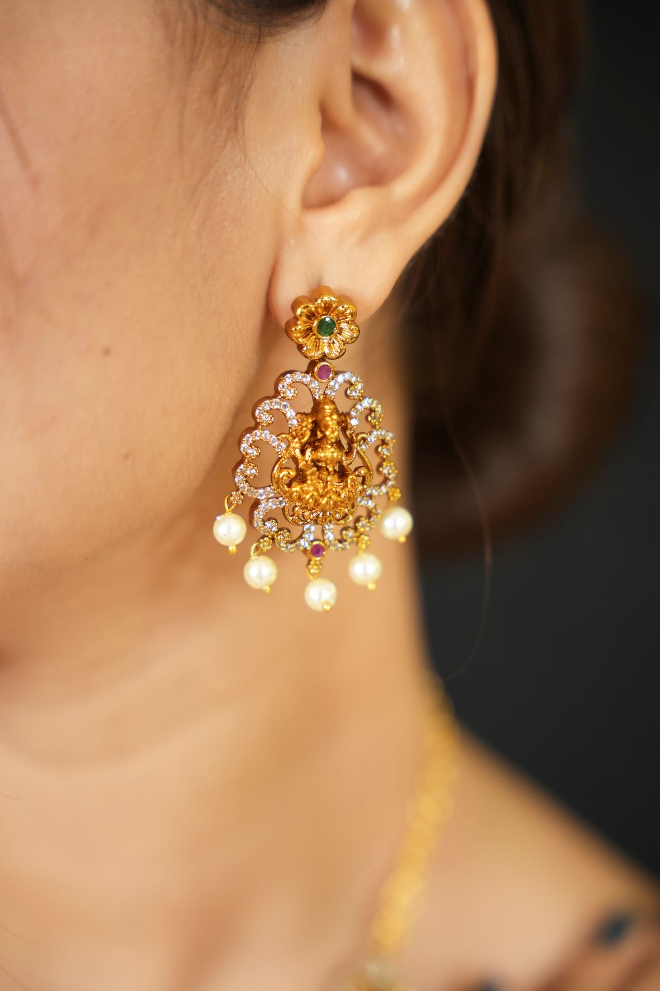 Regal Goddess Temple Jewelry Set with Intricate Gold Detailing and Pearl Accents