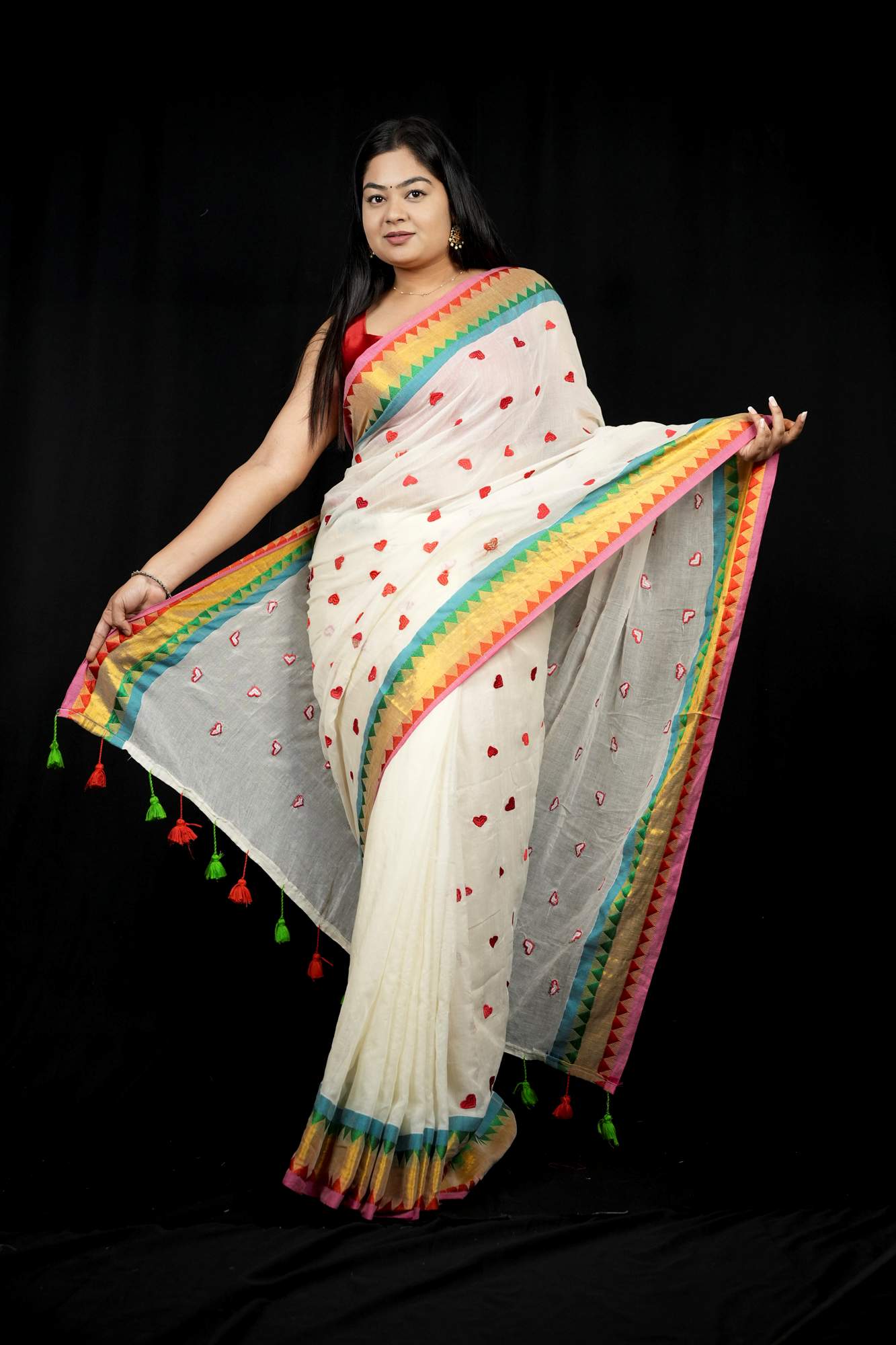 Handcrafted Mulmul Cotton with Geometric Border and Tassel Ready To wear Saree