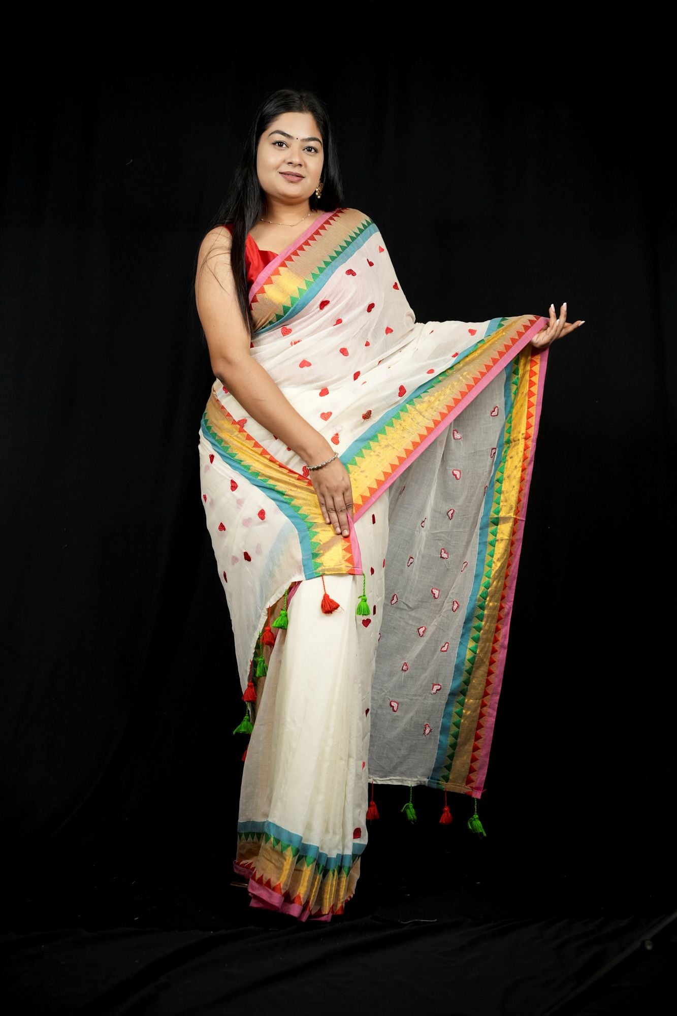 Handcrafted Mulmul Cotton with Geometric Border and Tassel Ready To wear Saree