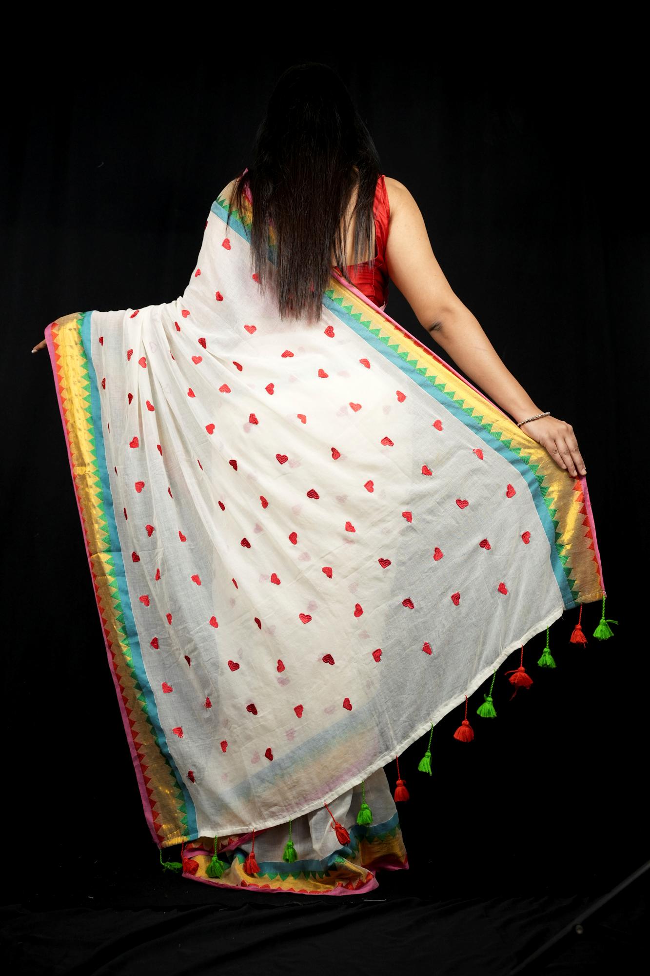 Handcrafted Mulmul Cotton with Geometric Border and Tassel Ready To wear Saree