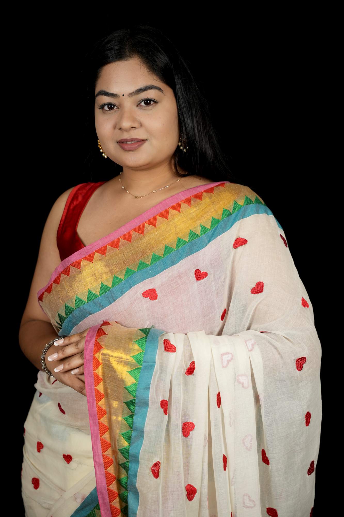 Handcrafted Mulmul Cotton with Geometric Border and Tassel Ready To wear Saree