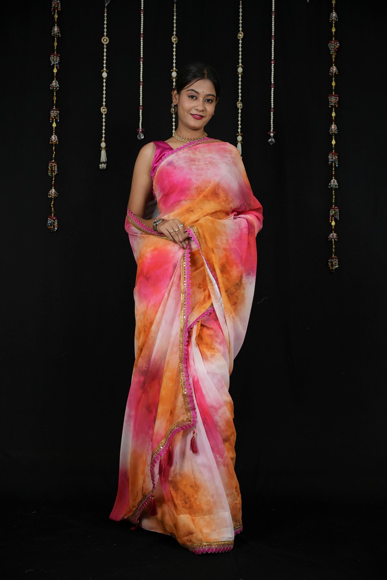 Georgette Tie-Dye in Pink, Orange, and White with Tassels Ready To Wear Saree