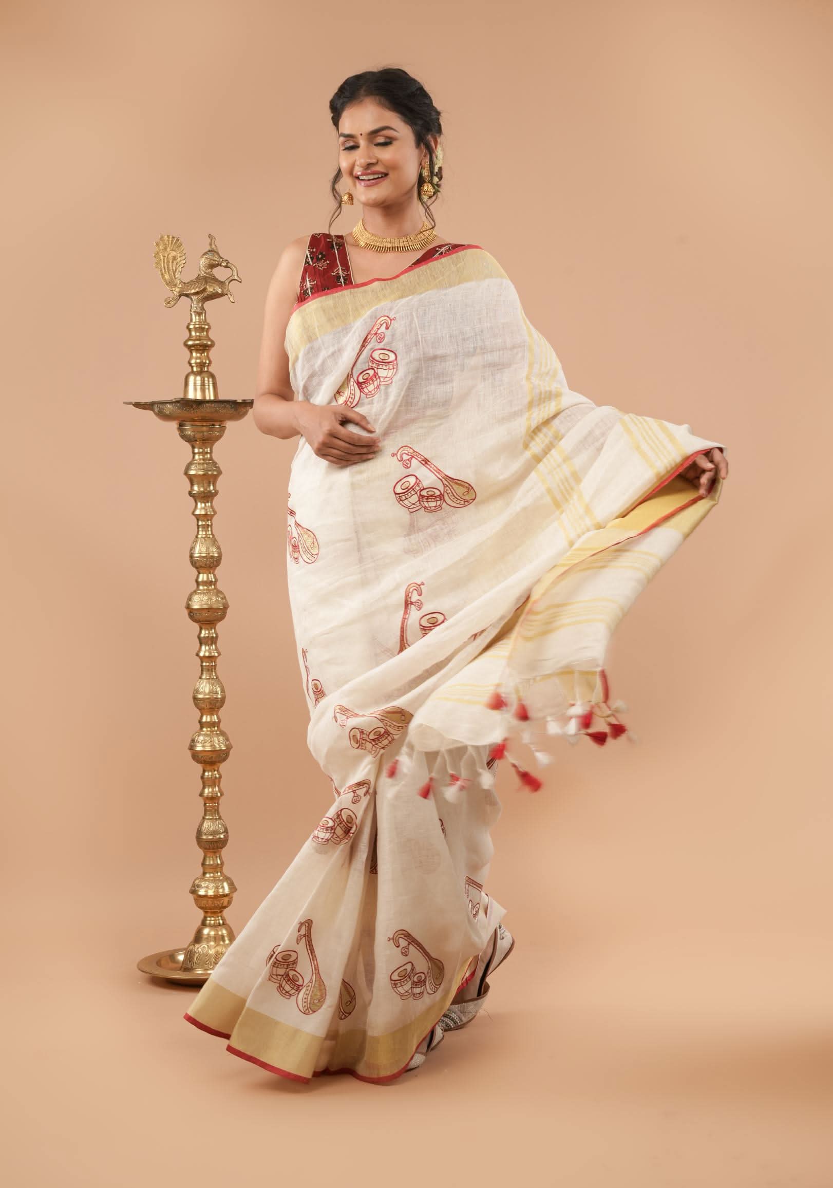 Linen by Linen Saree in White with Musical instruments embroidery motifs | Shobitam