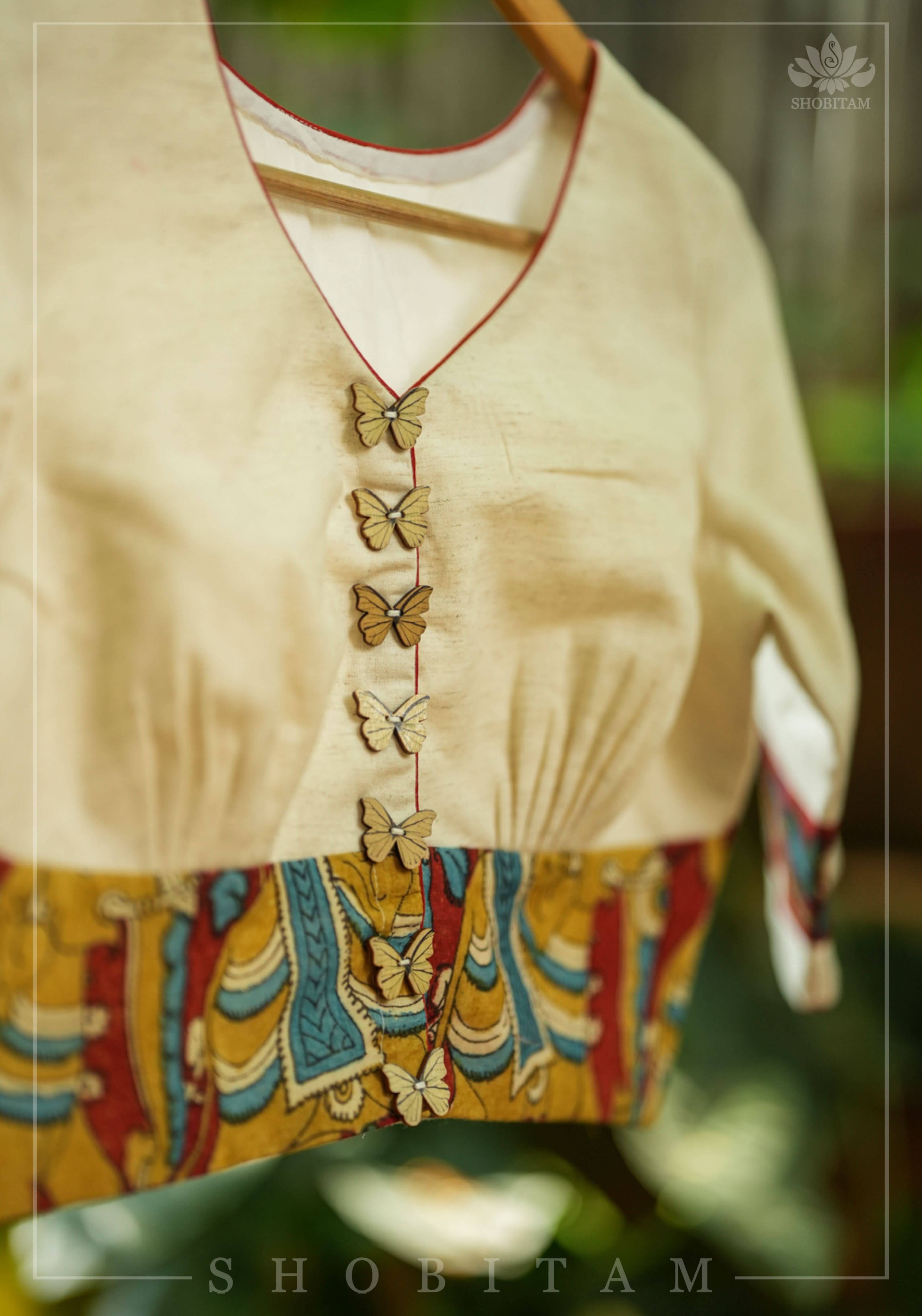 Daisy white V neck blouse with handpainted kalamkari border | Shobitam