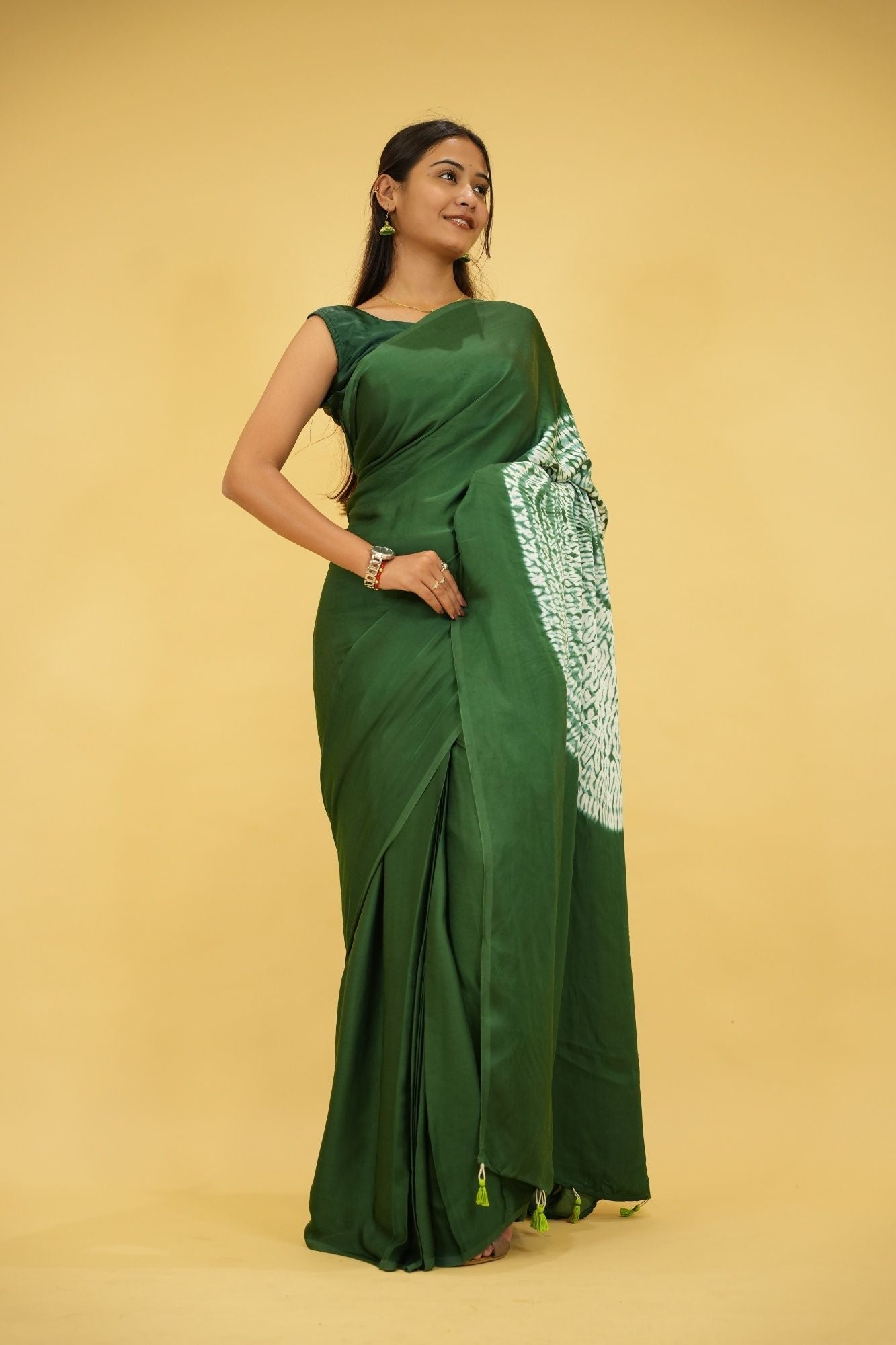 Pre drape Hand Shibori mandala Dye on Green Modal Silk And Tassel On Pallu saree