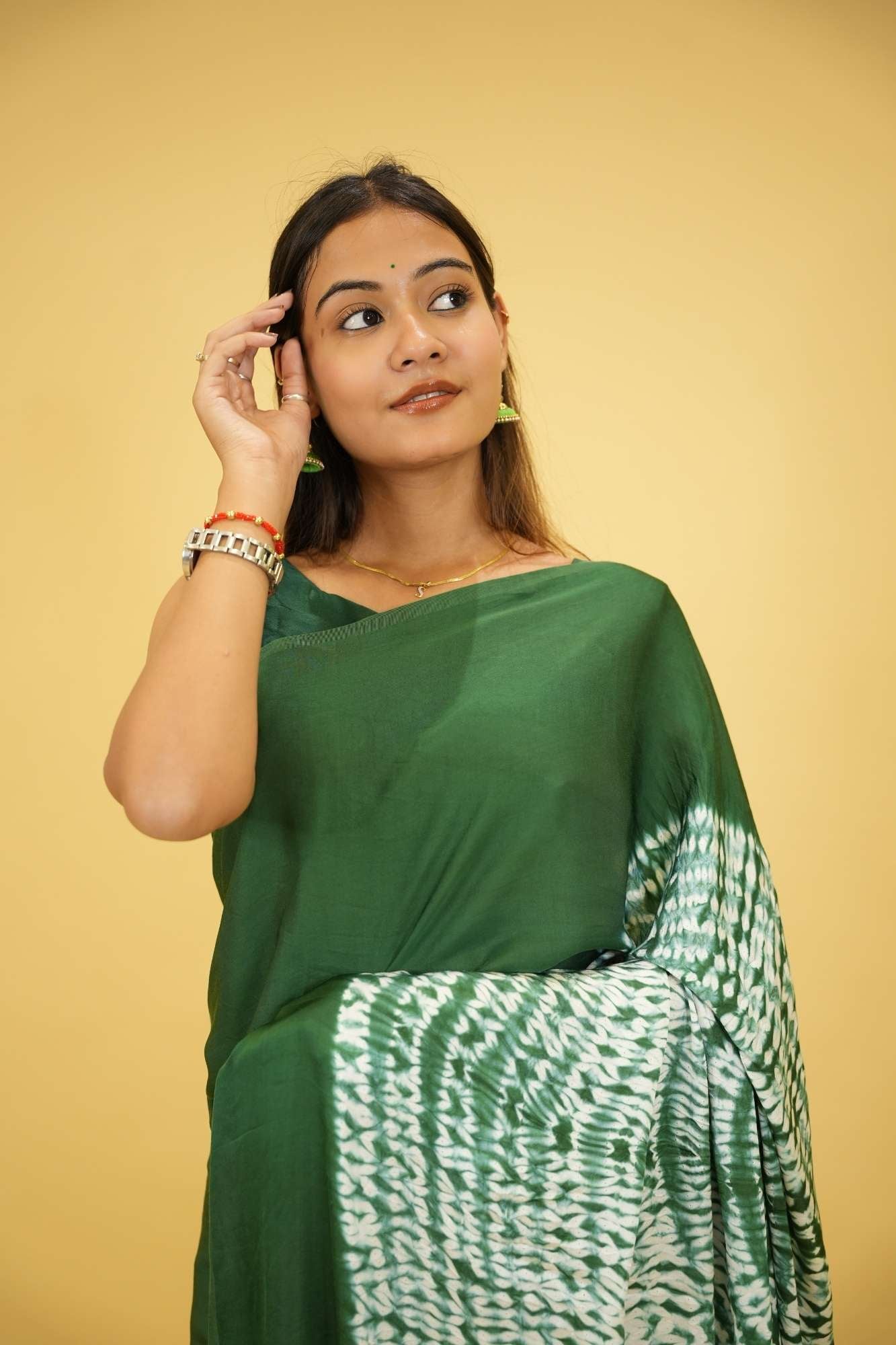 Pre drape Hand Shibori mandala Dye on Green Modal Silk And Tassel On Pallu saree