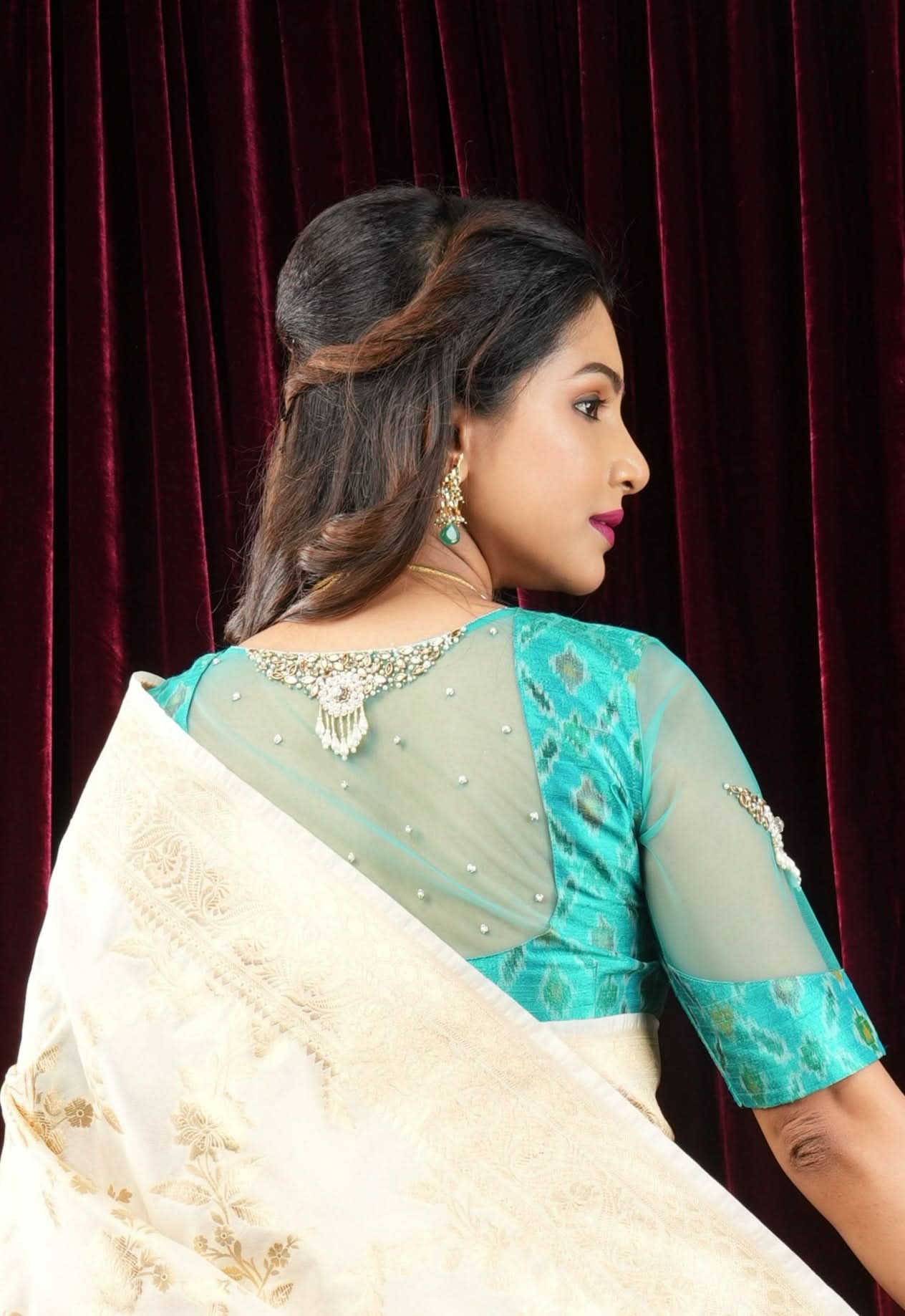 Cyan Pure ikkat Raw silk blouse with Rhinestone detailing in back and sleeves | Shobitam