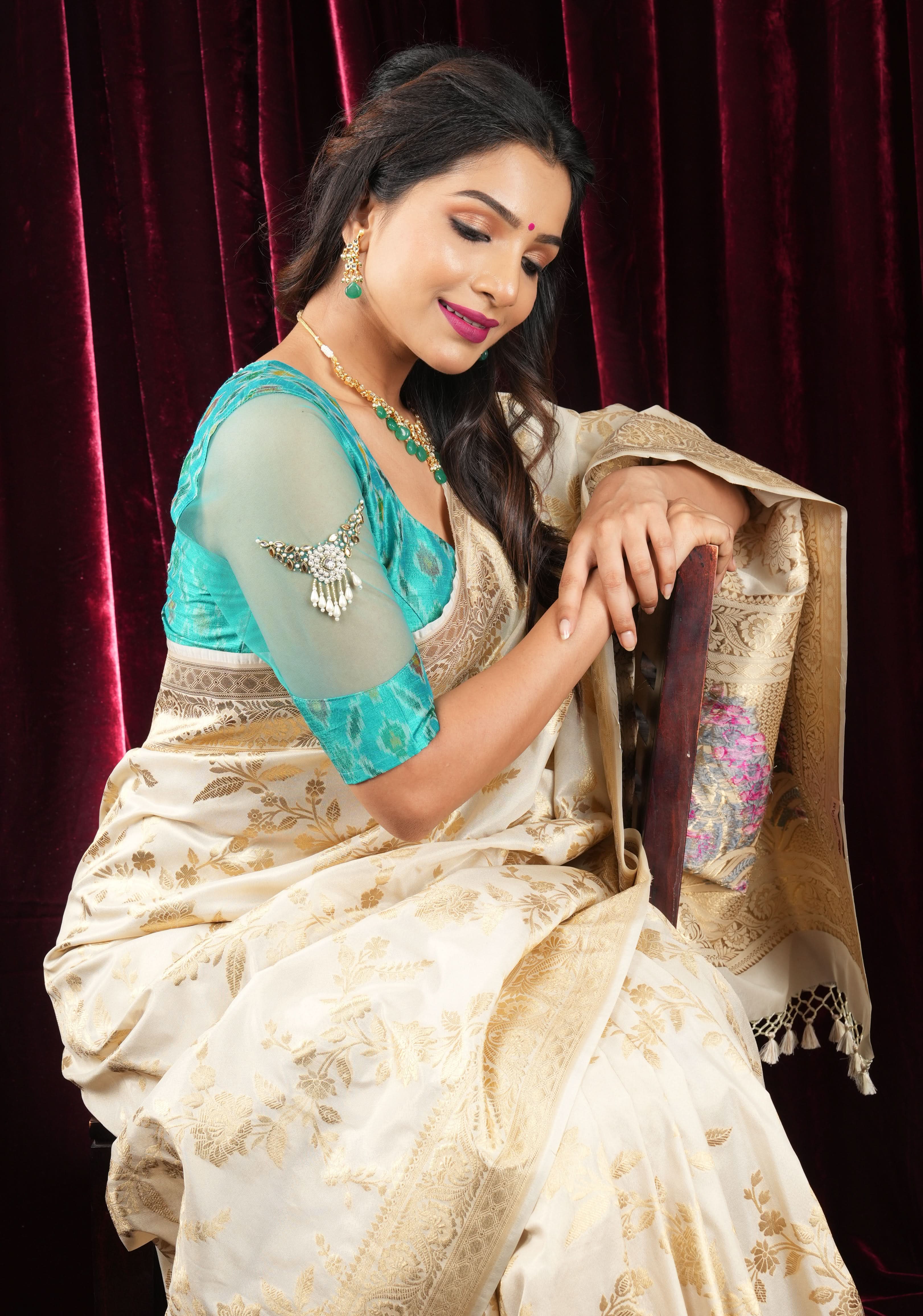 Cyan Pure ikkat Raw silk blouse with Rhinestone detailing in back and sleeves | Shobitam