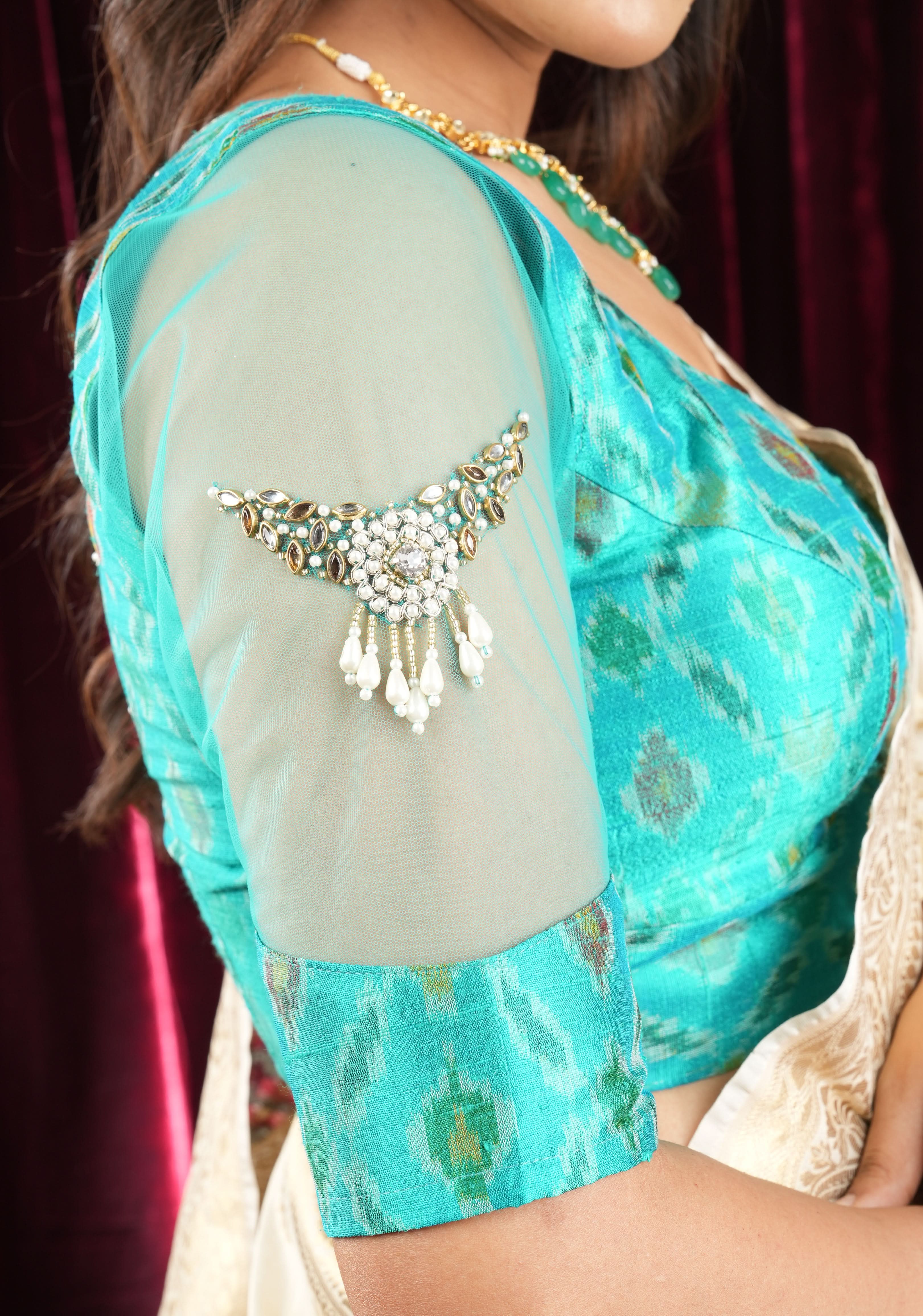 Cyan Pure ikkat Raw silk blouse with Rhinestone detailing in back and sleeves | Shobitam