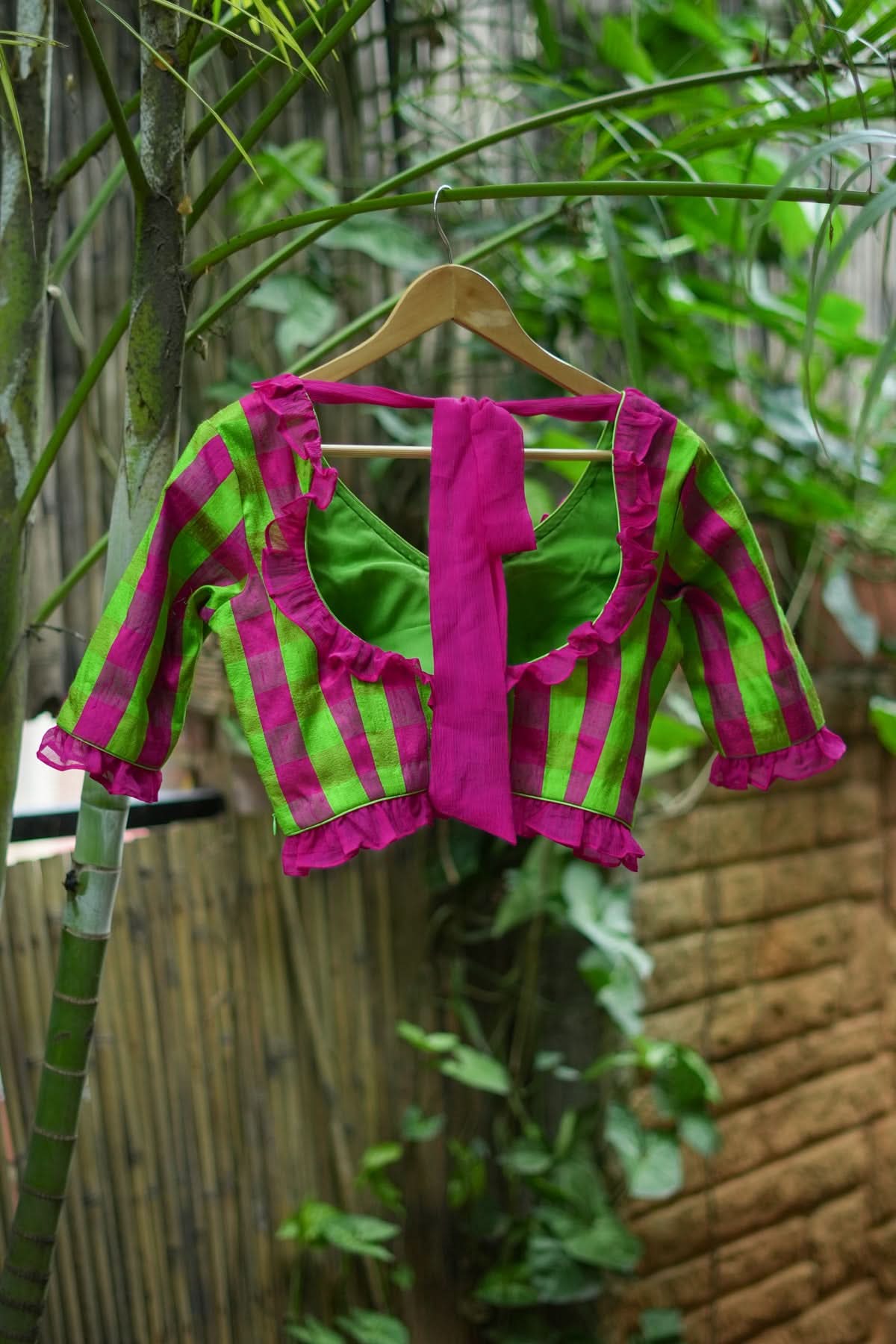 Green pink checked pure raw silk V neck blouse with chiffon frills | Shobitam