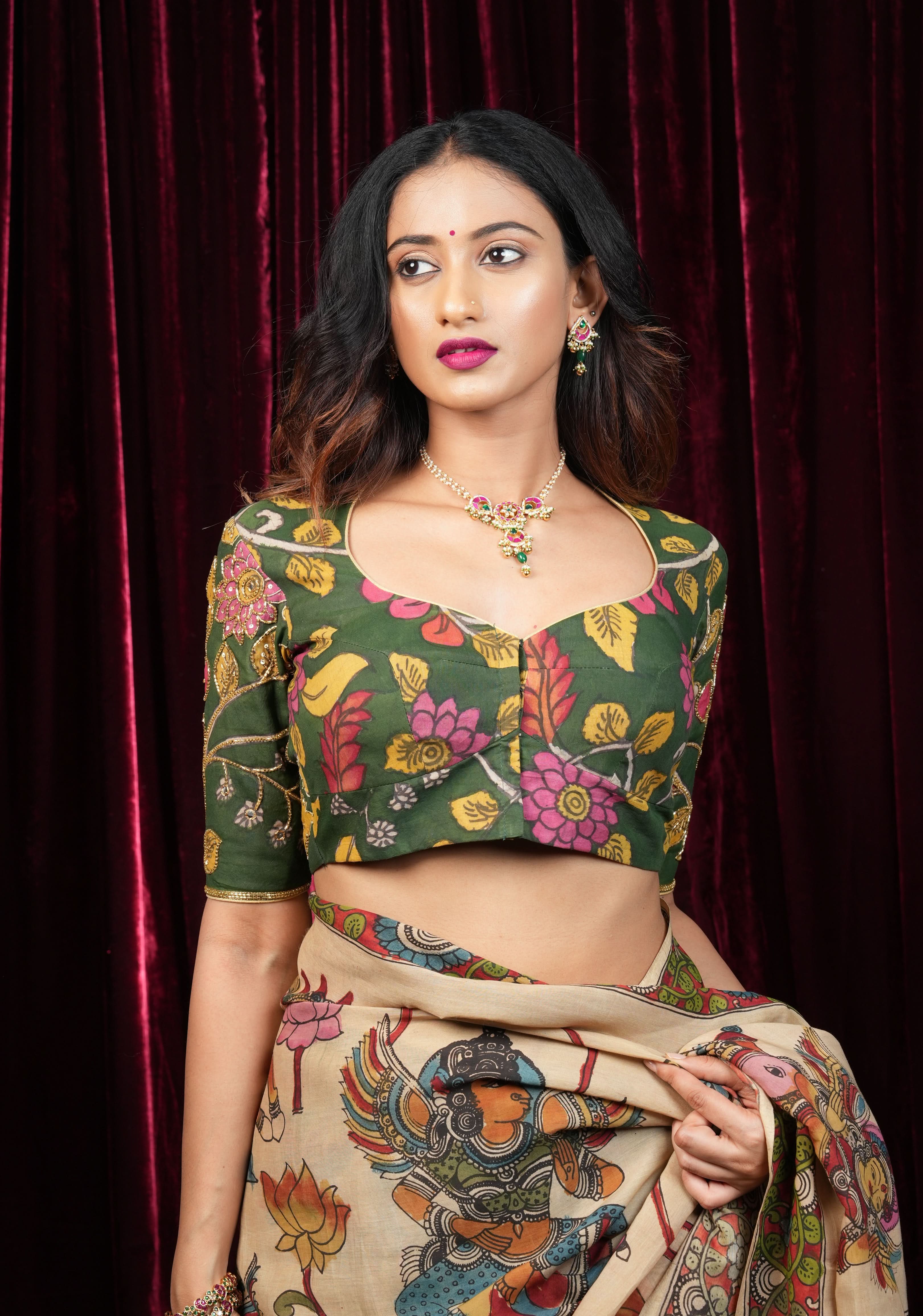 Pure Pen Kalamkari Blouse in olive green with peacock motifs and cutdana sequin hand work | Shobitam