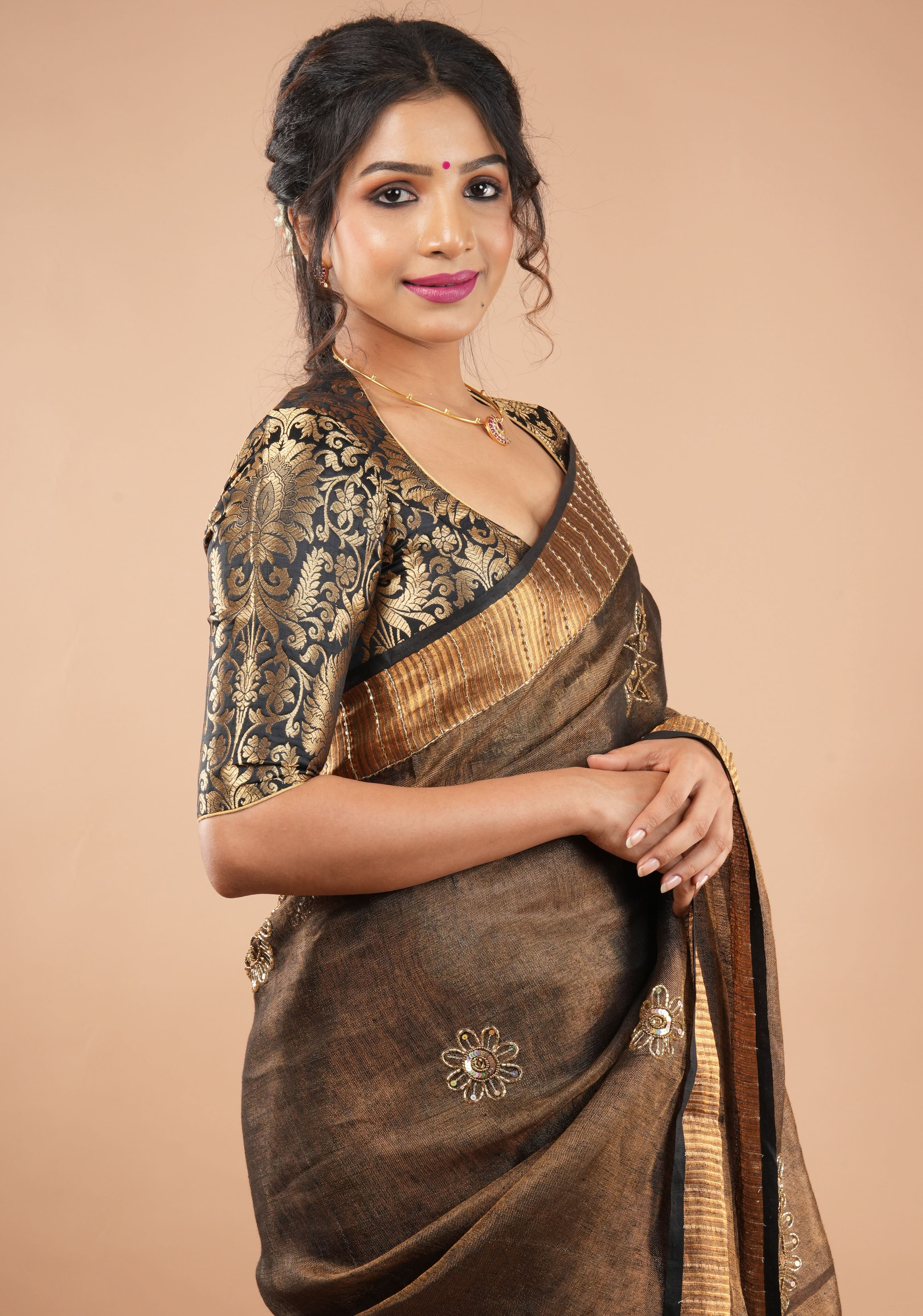 Embroidery cut dana with seqins Work Tissue Linen Saree in copper black with dramatic work Pallu | Shobitam
