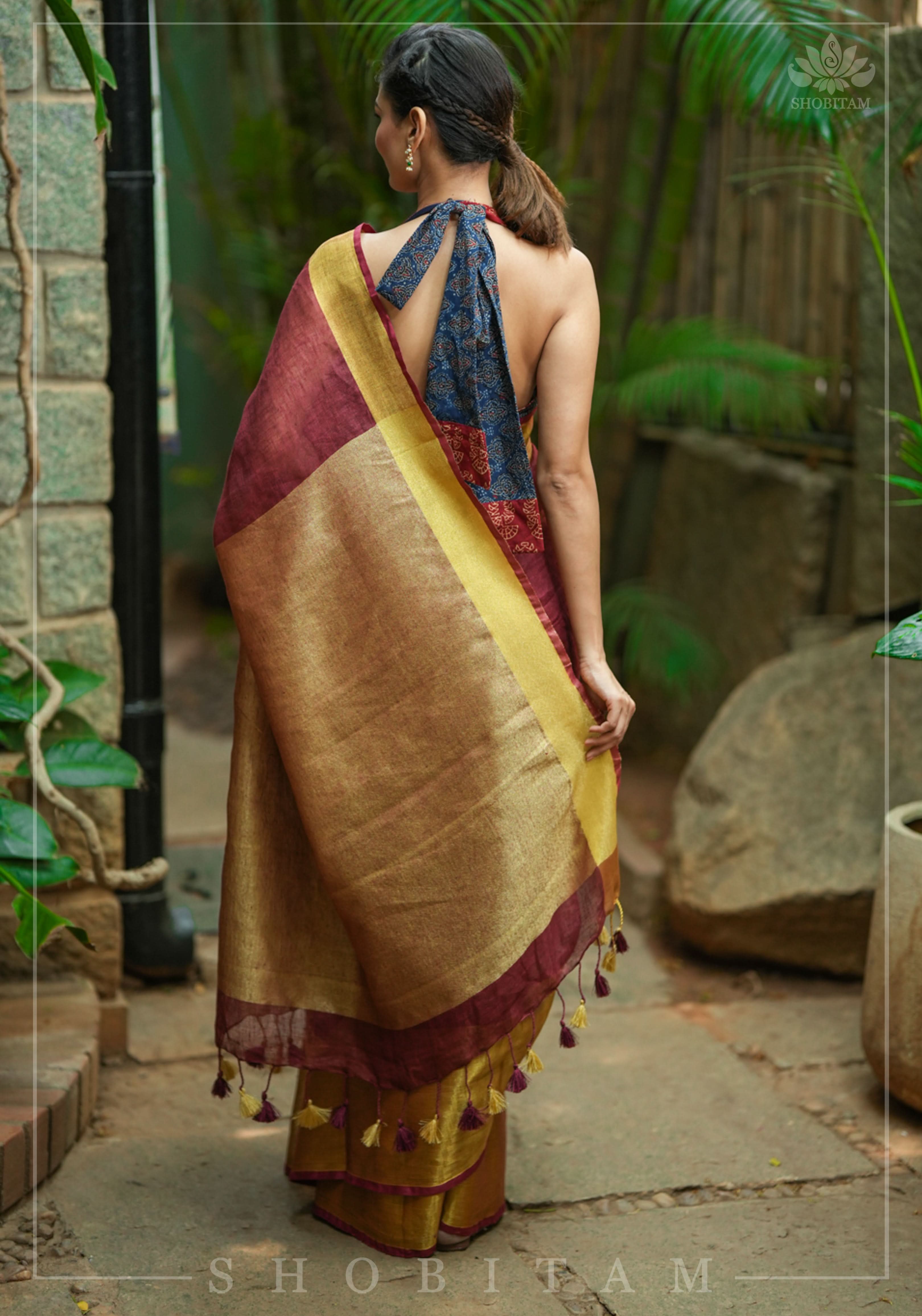 Wide Antique Golden Border Linen by Linen Saree in Maroon | Shobitam
