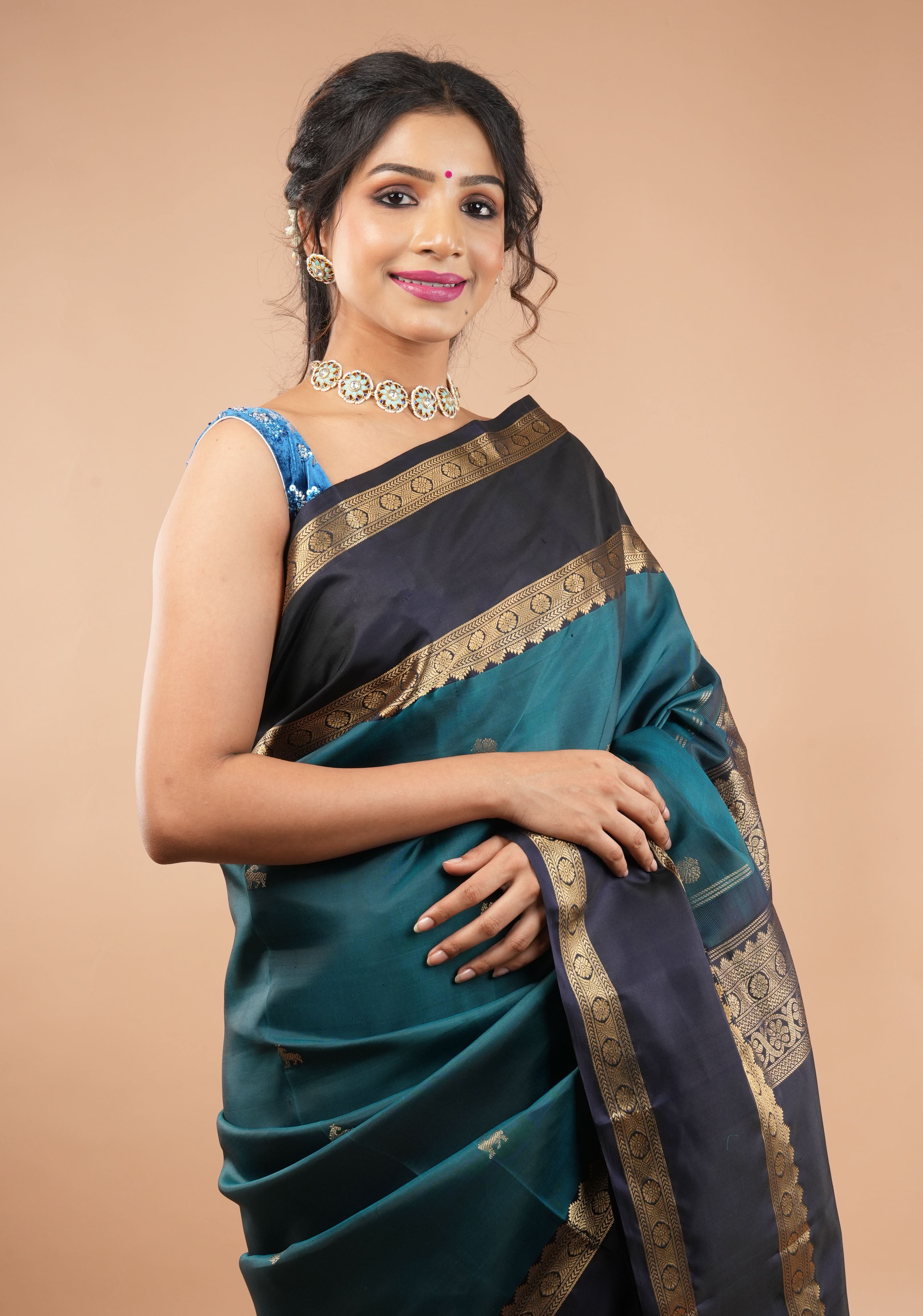 Cobalt Blue Velvet floral embroidery and sequins sleeveless blouse with blue dangling beads at the back | Shobitam
