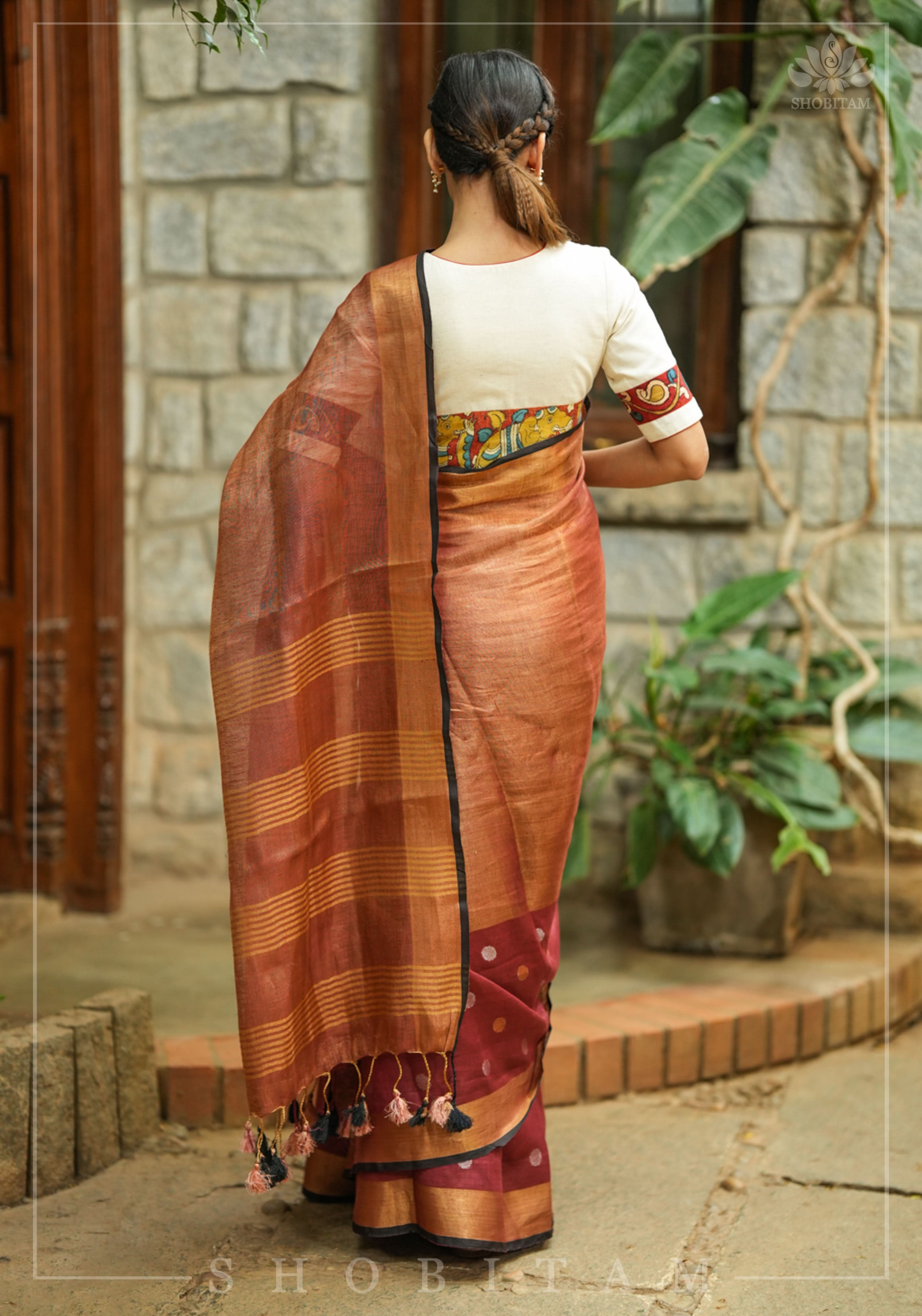 Maroon Tissue Body Linen Saree in Muted Antique Gold with Sona Rupa Polka Dots Skirt Border | Shobitam