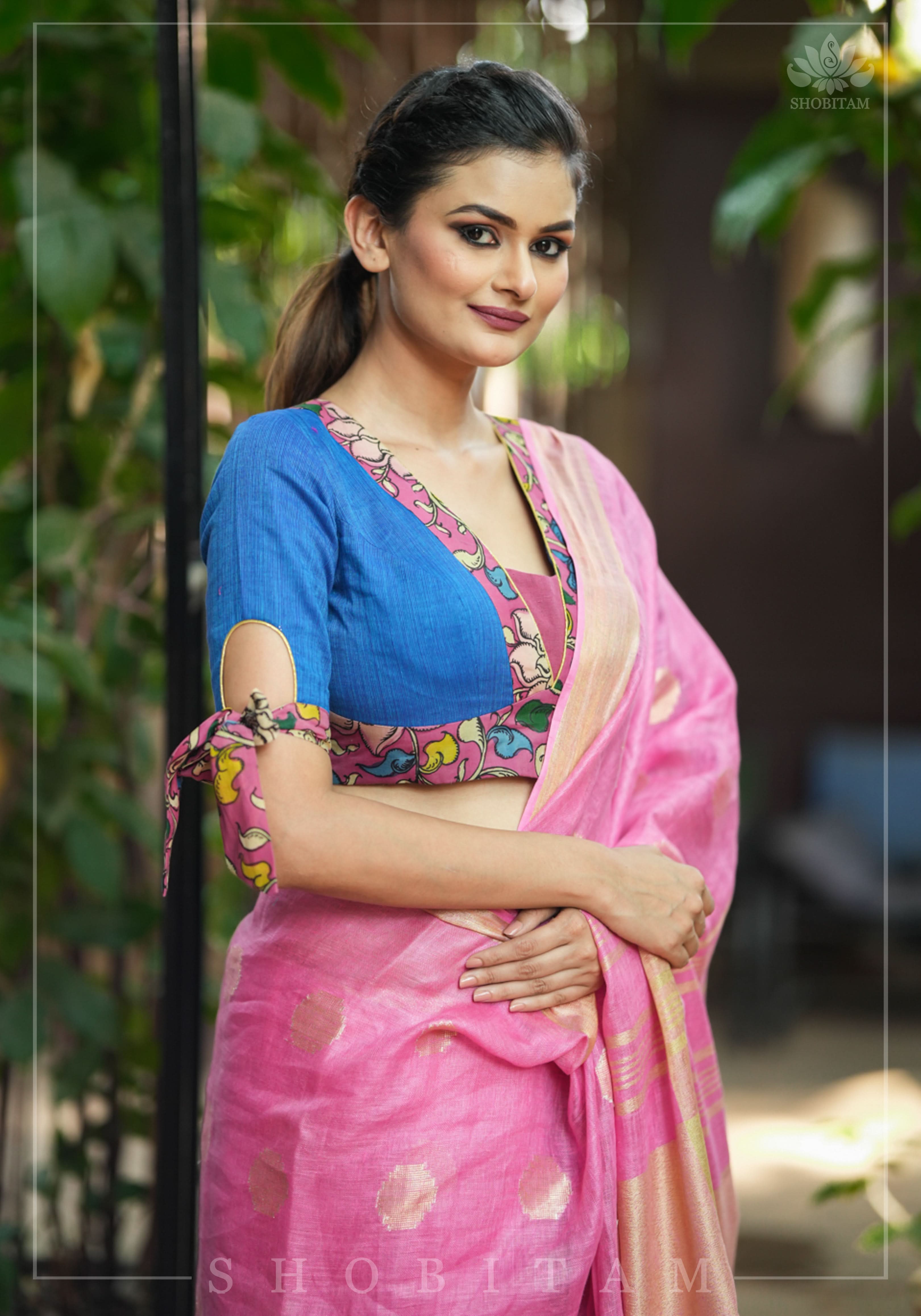 Ocean blue handloom V neck blouse with rose pink handpainted kalamkari border detailing. | Shobitam