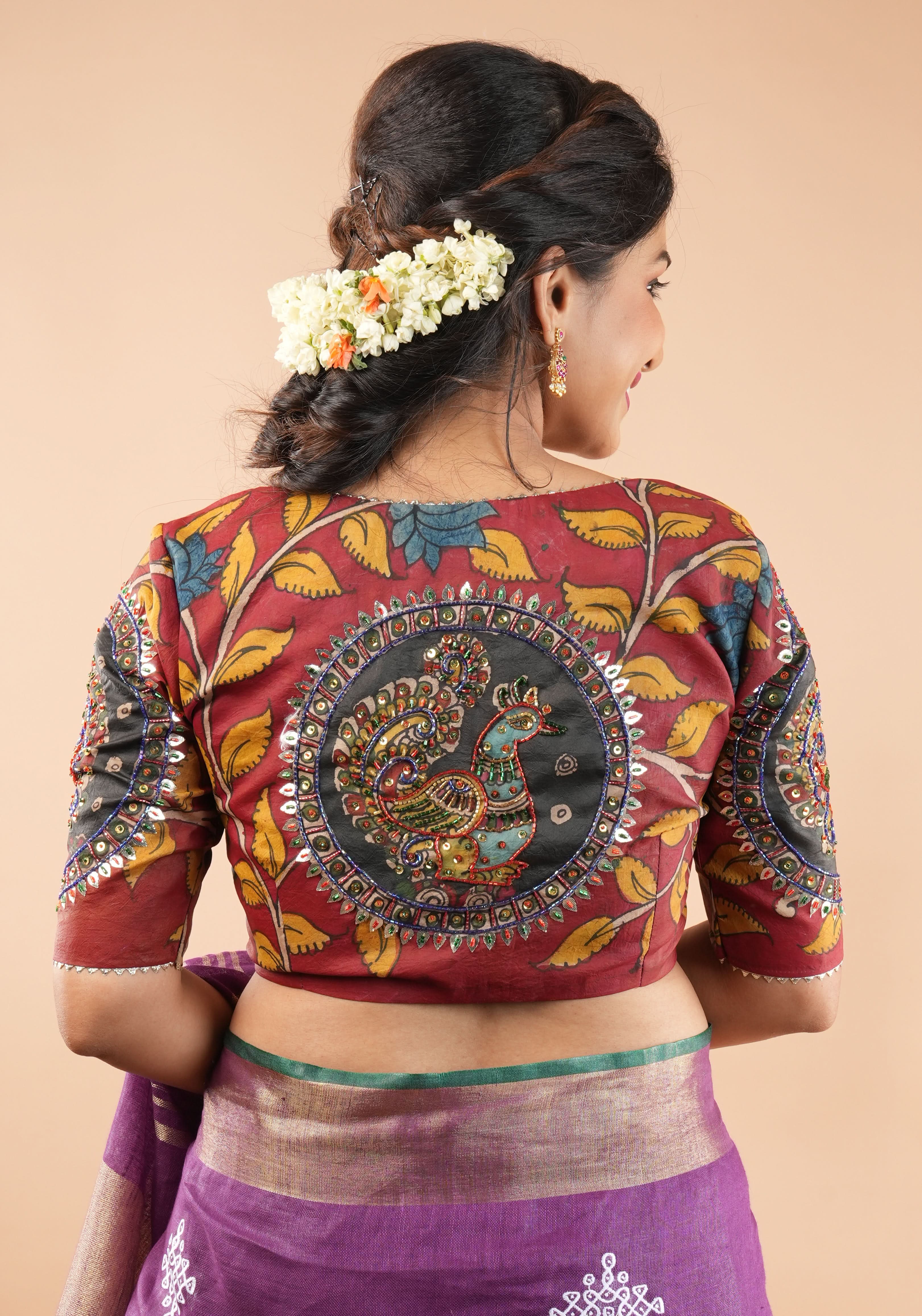 Red Kalamkari blouse with peacock designs, and cutdana, gotta and sequins handwork | Shobitam