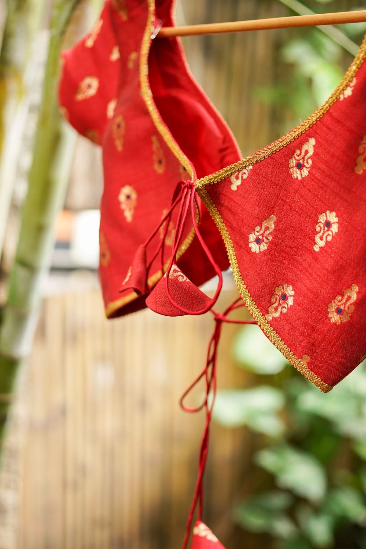 Deep V Neck Tie Back Blouse in Red with Gold Motifs! | Shobitam