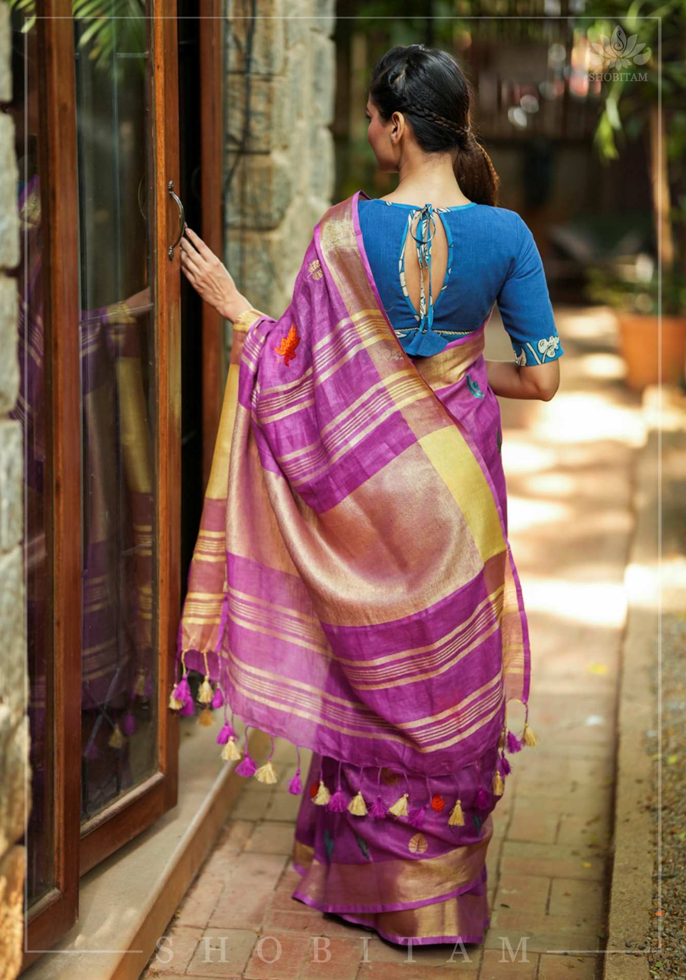 Saphire blue closed neck handloom blouse with handpainted kalamkari border