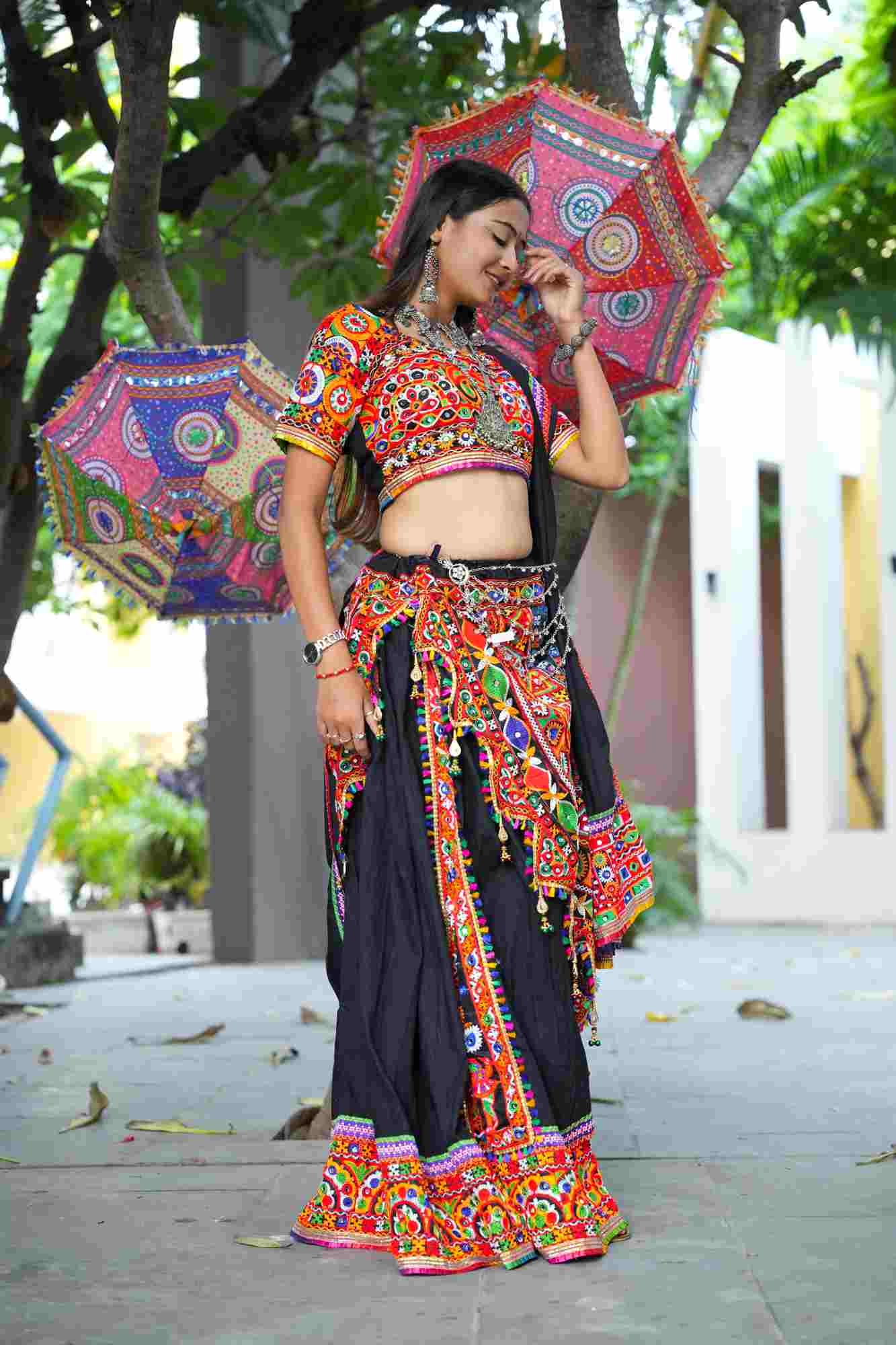 Black Kutchi Hand-Embroidered Ghagra Choli with Vibrant Mirror Work and Multicolor Thread Embellishments
