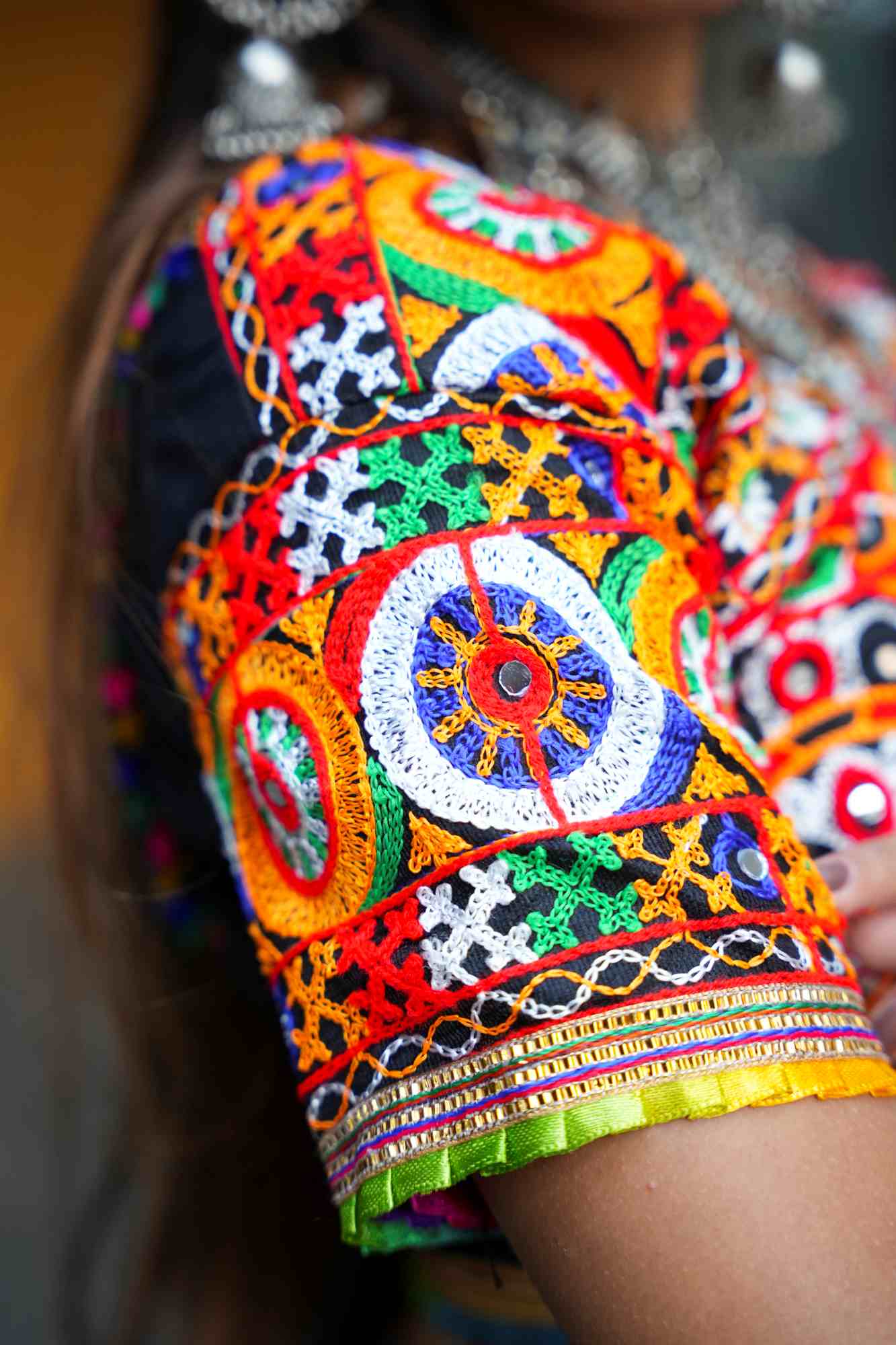 Black Kutchi Hand-Embroidered Ghagra Choli with Vibrant Mirror Work and Multicolor Thread Embellishments