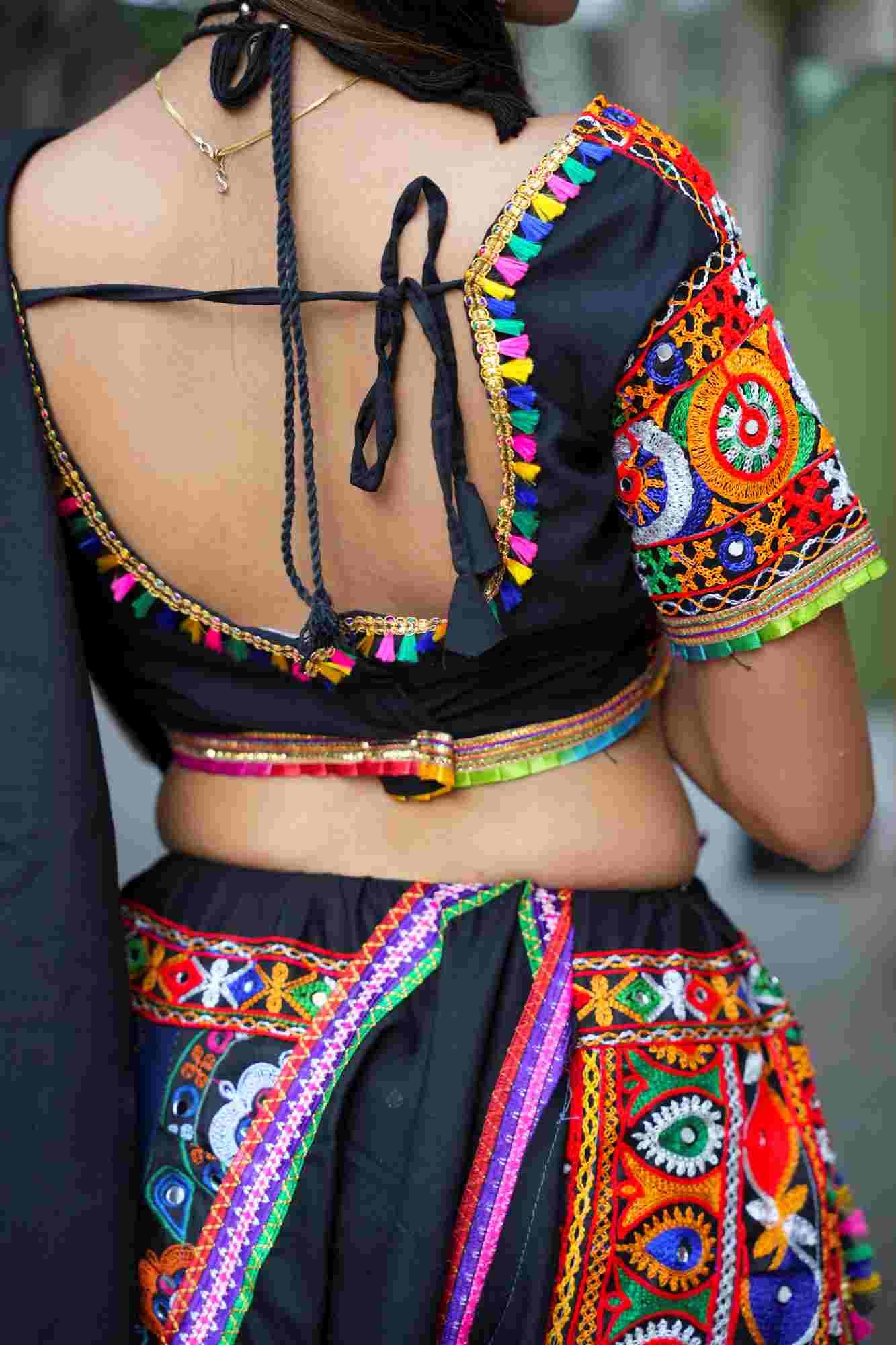 Black Kutchi Hand-Embroidered Ghagra Choli with Vibrant Mirror Work and Multicolor Thread Embellishments