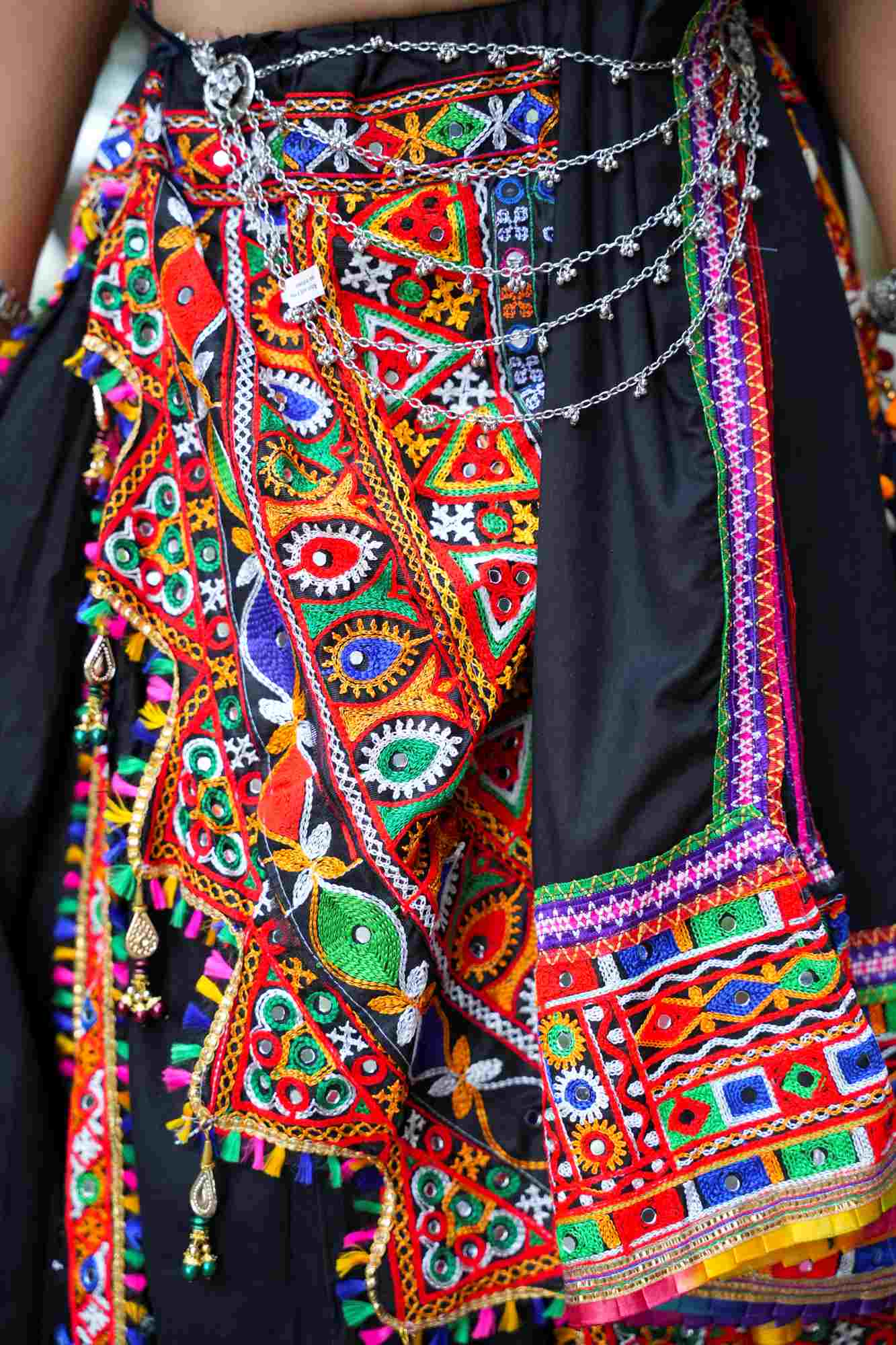 Black Kutchi Hand-Embroidered Ghagra Choli with Vibrant Mirror Work and Multicolor Thread Embellishments