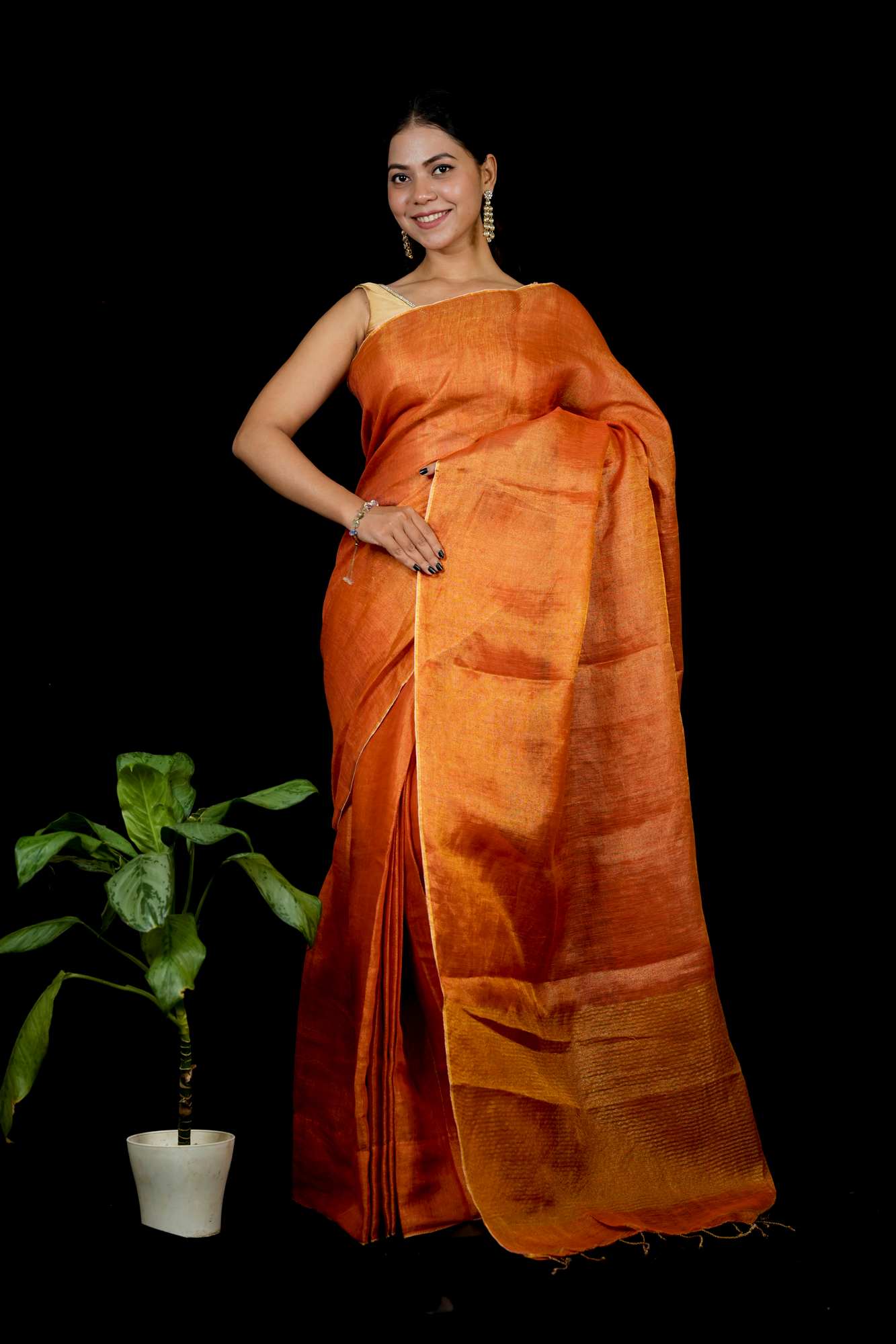 Tissue Linen with Zari Detailing & Tassels Ready To Wear Saree
