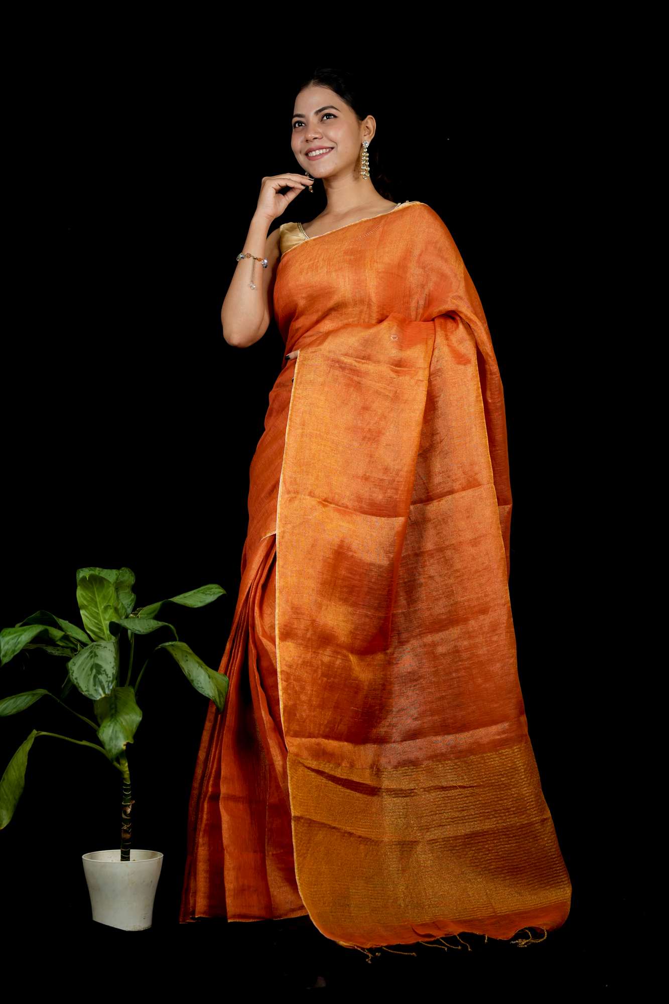 Tissue Linen with Zari Detailing & Tassels Ready To Wear Saree