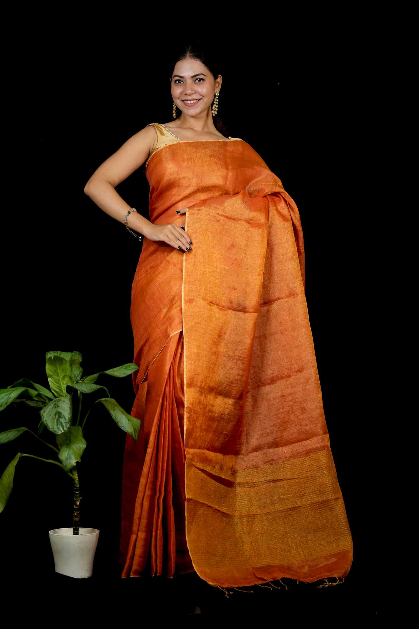 Tissue Linen with Zari Detailing & Tassels Ready To Wear Saree
