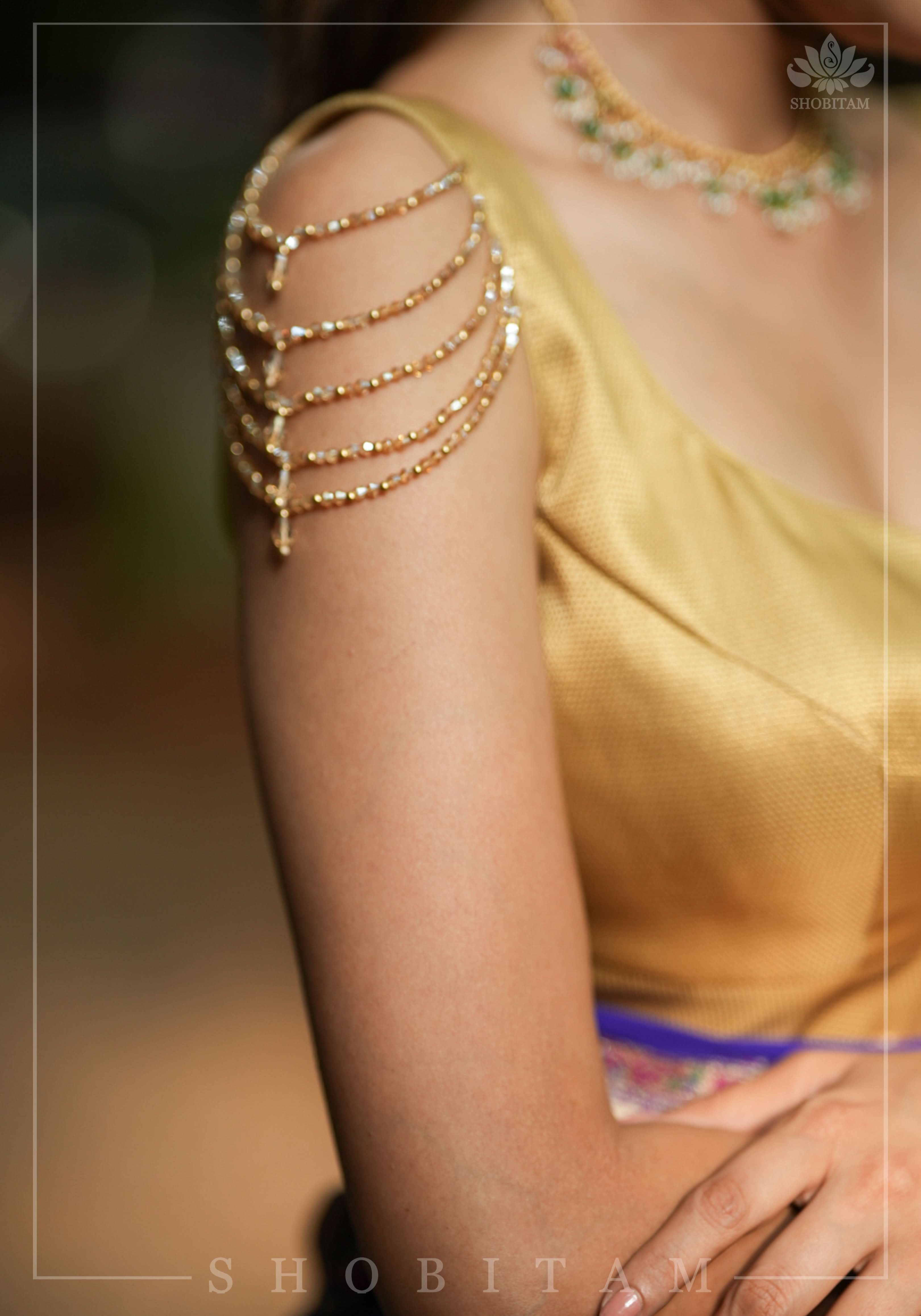 Golden Self Weave Geometric Design Blouse with Dangling multirow crystals over upper arm | Shobitam