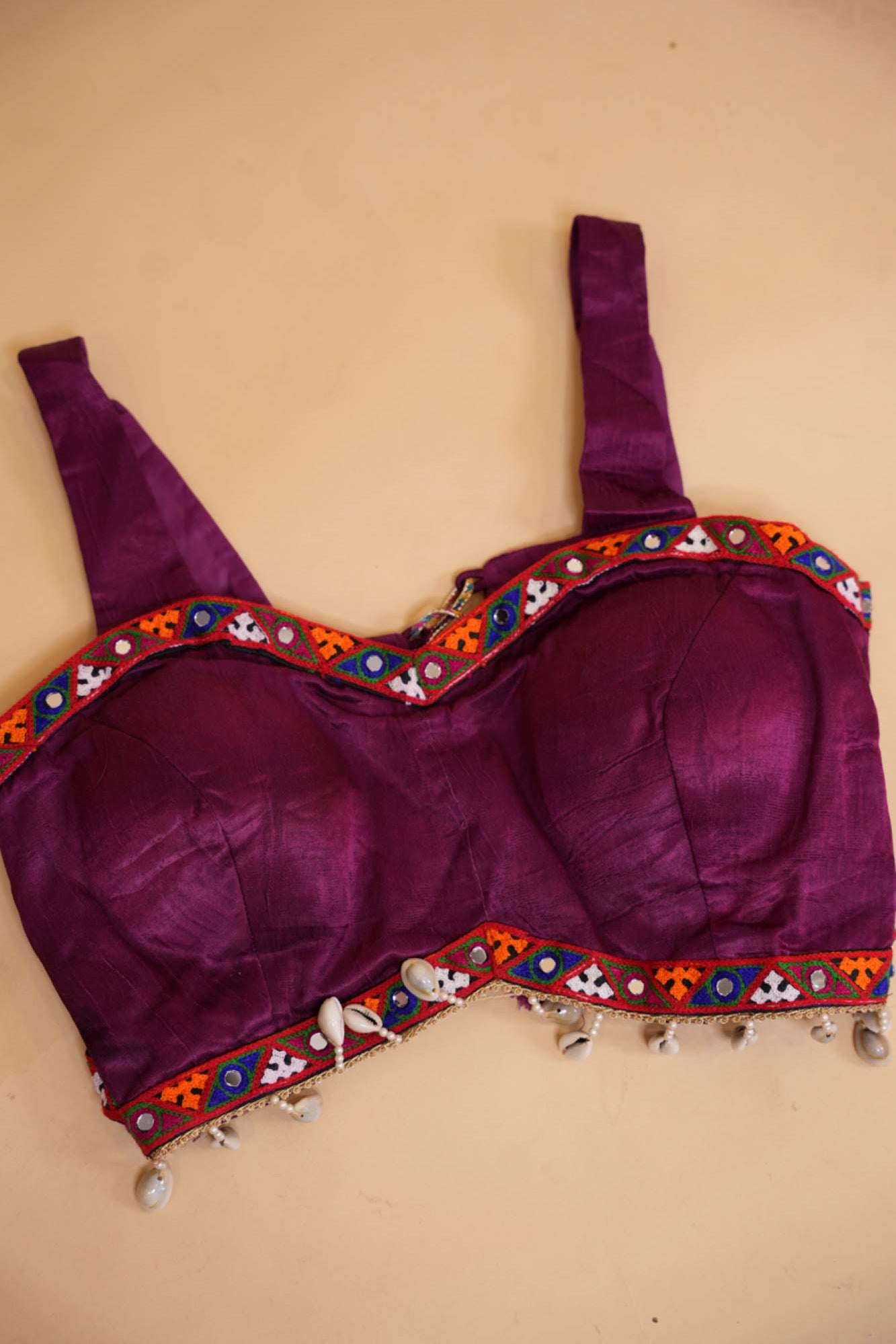 Stylish Navratri-Inspired Purple Blouse with Multicolor Embroidered Border & Cowrie Shell Accents