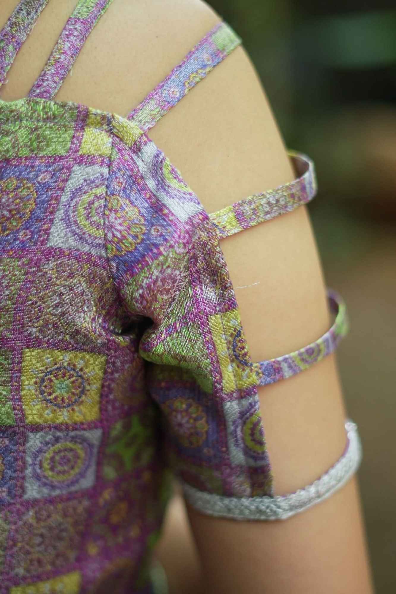Multicolor Printed Blouse on Lavender Base with multi-strapped sleeves