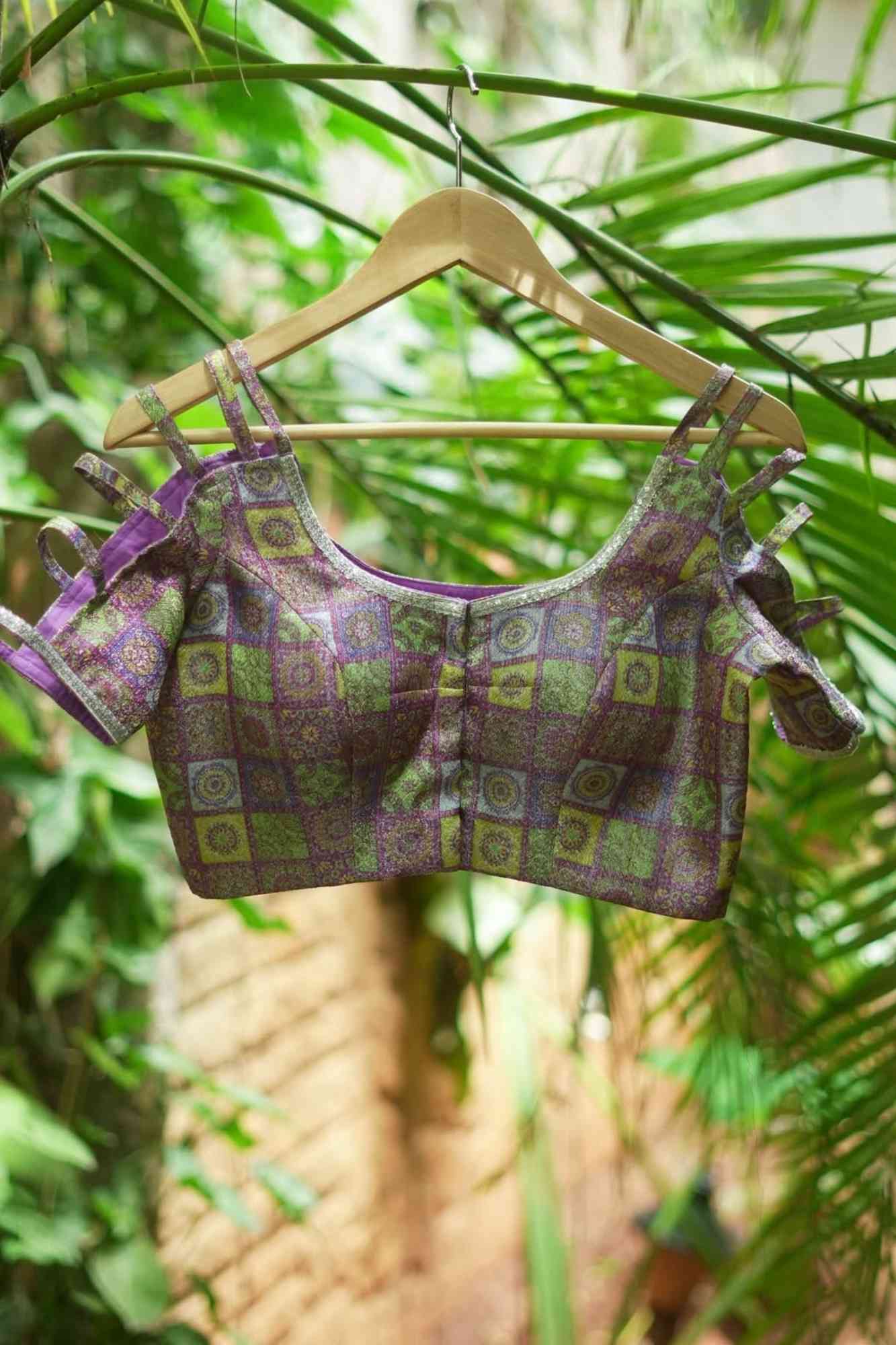 Multicolor Printed Blouse on Lavender Base with multi-strapped sleeves