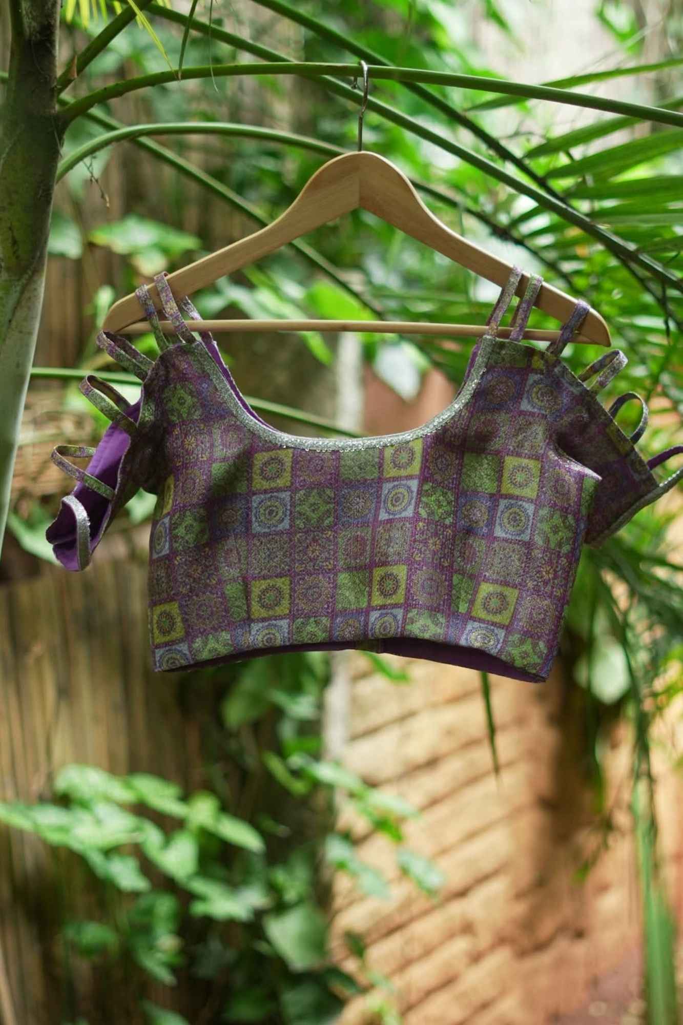 Multicolor Printed Blouse on Lavender Base with multi-strapped sleeves