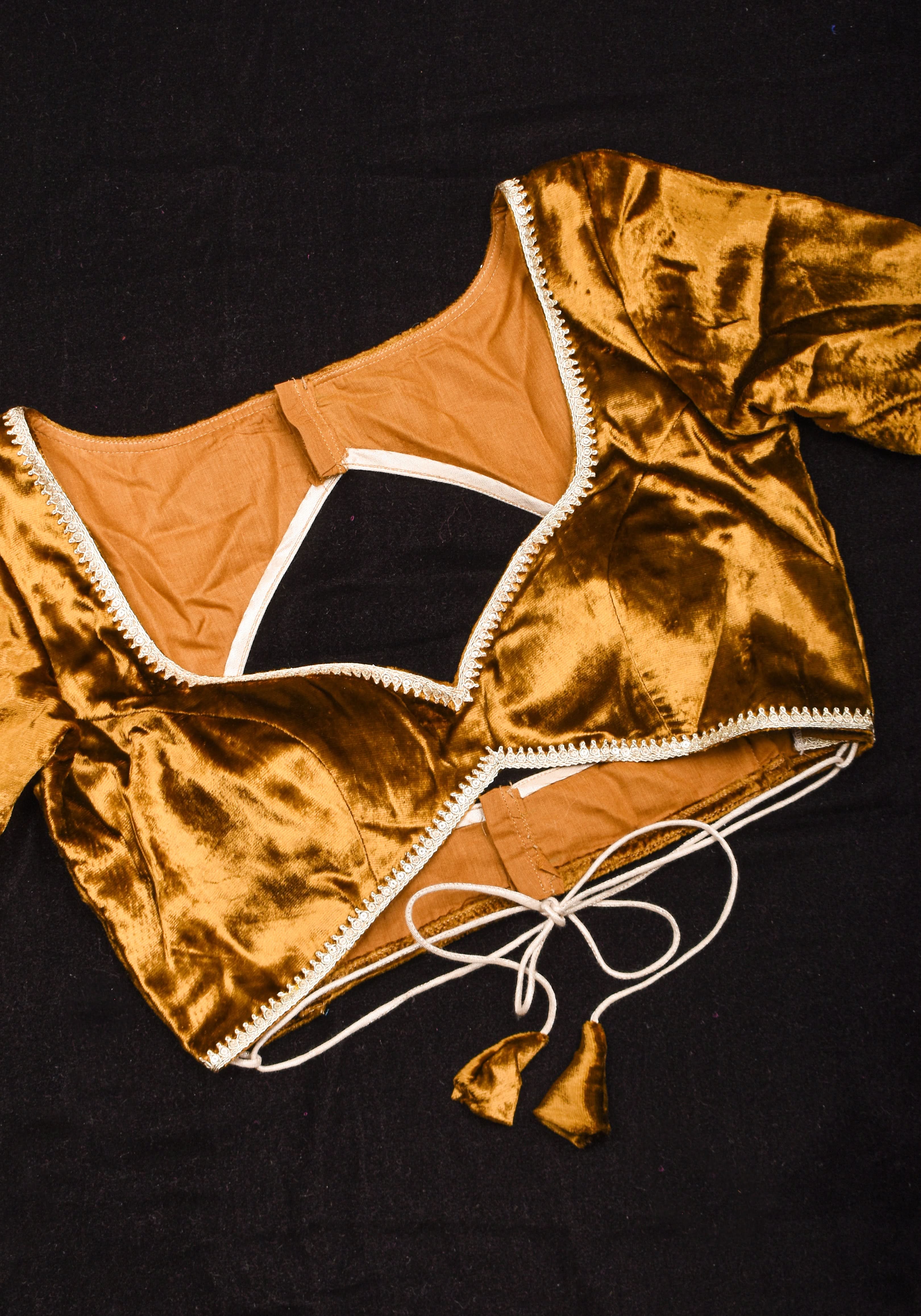 Exquisite Amber Brown Velvet Blouse with Deep Sweet Heart Neck and Tie up Detailing | Shobitam