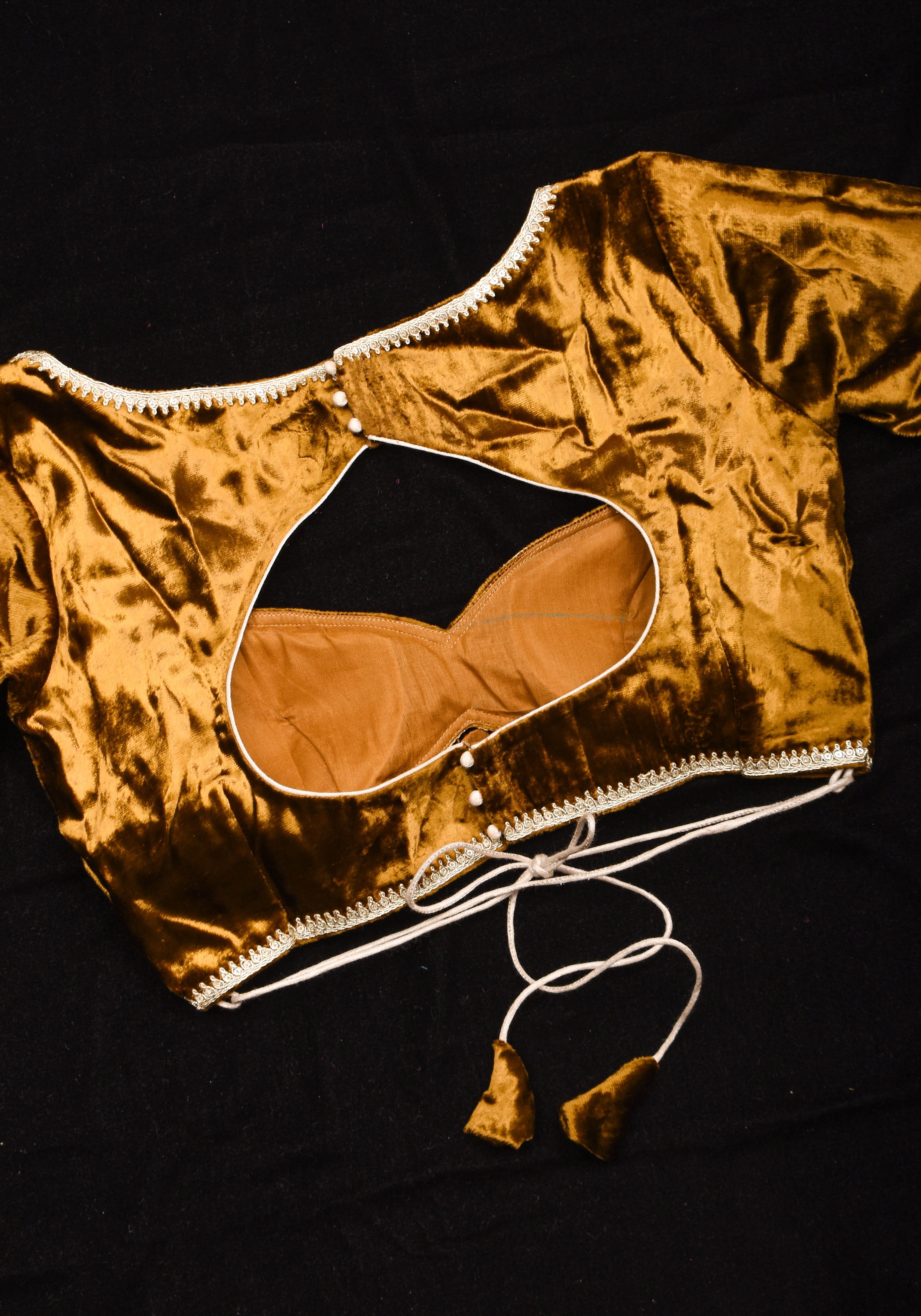 Exquisite Amber Brown Velvet Blouse with Deep Sweet Heart Neck and Tie up Detailing | Shobitam