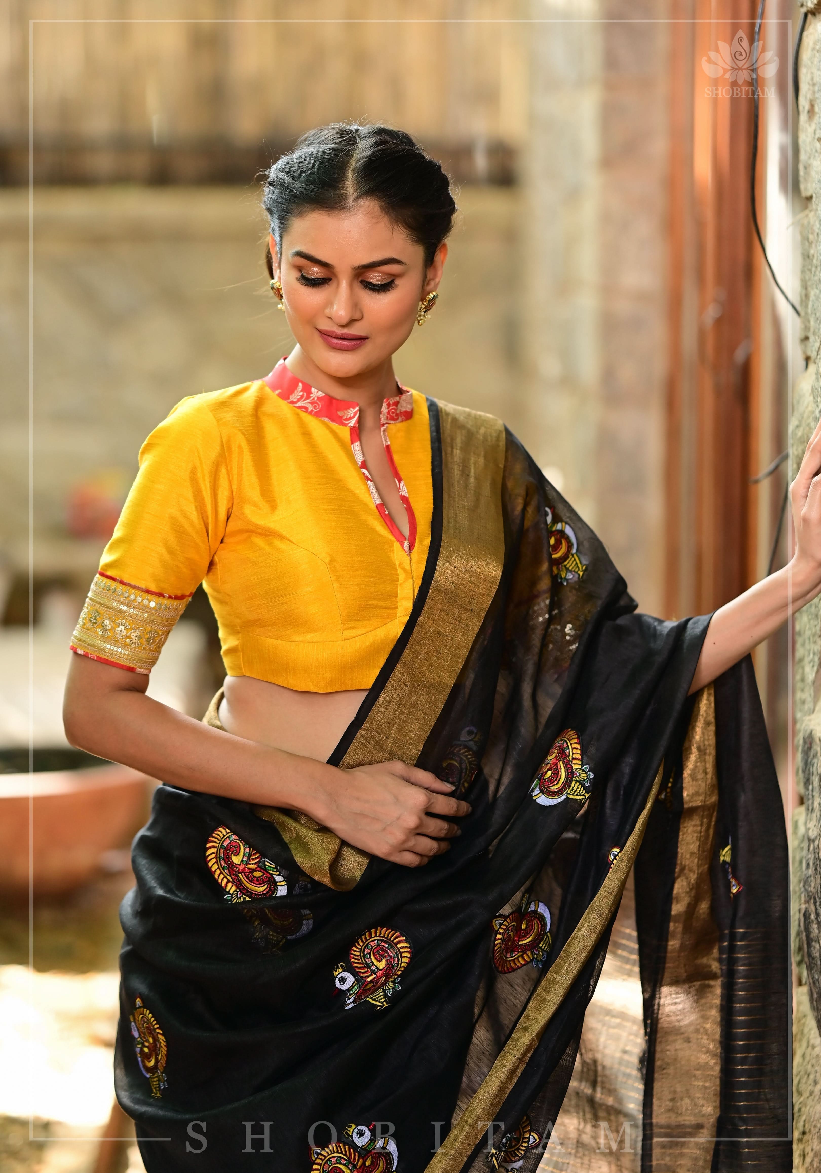 Annapakshi -the divine Swan embroidered motifs on Black Silk Linen Saree | Shobitam