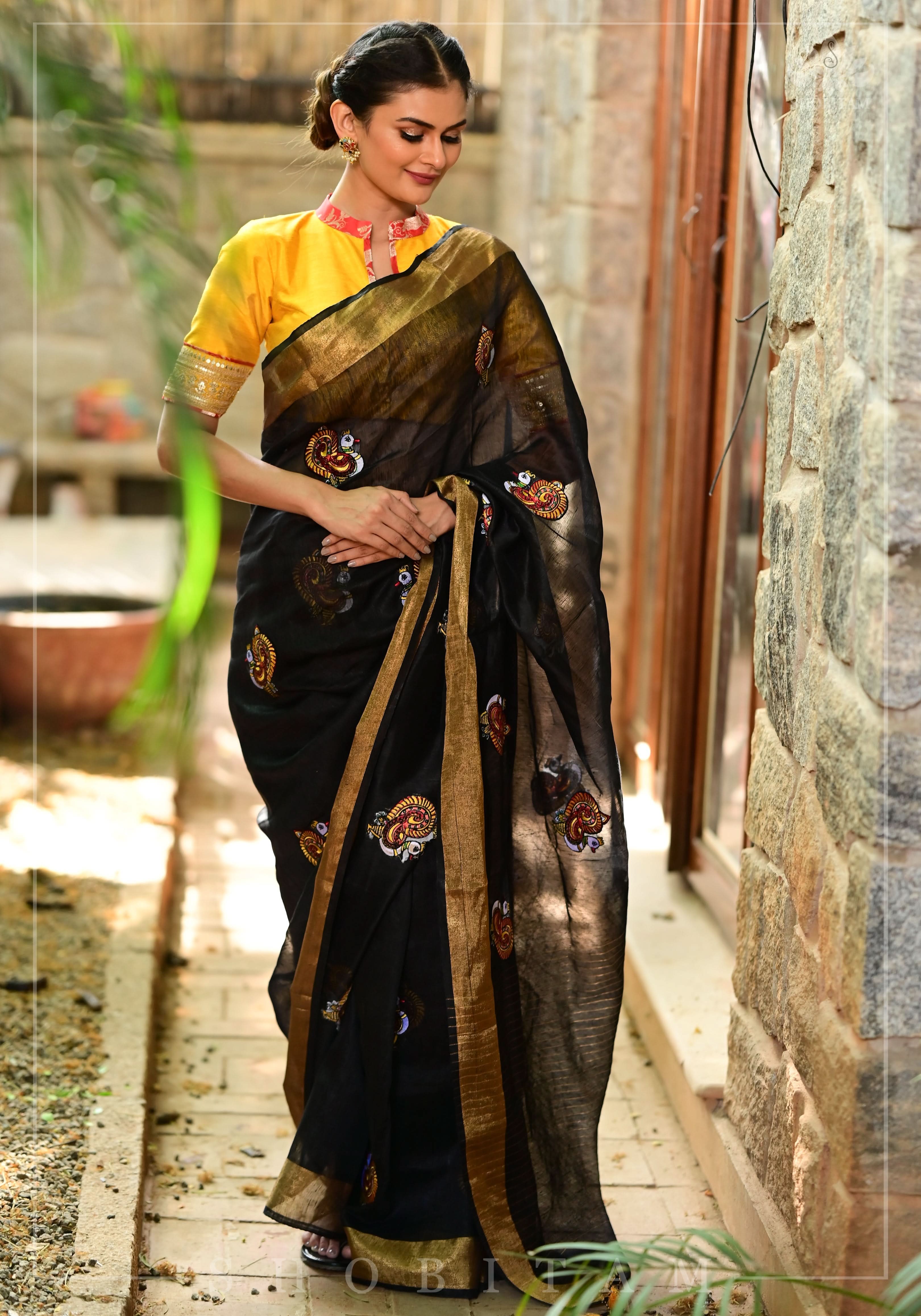 Annapakshi -the divine Swan embroidered motifs on Black Silk Linen Saree | Shobitam