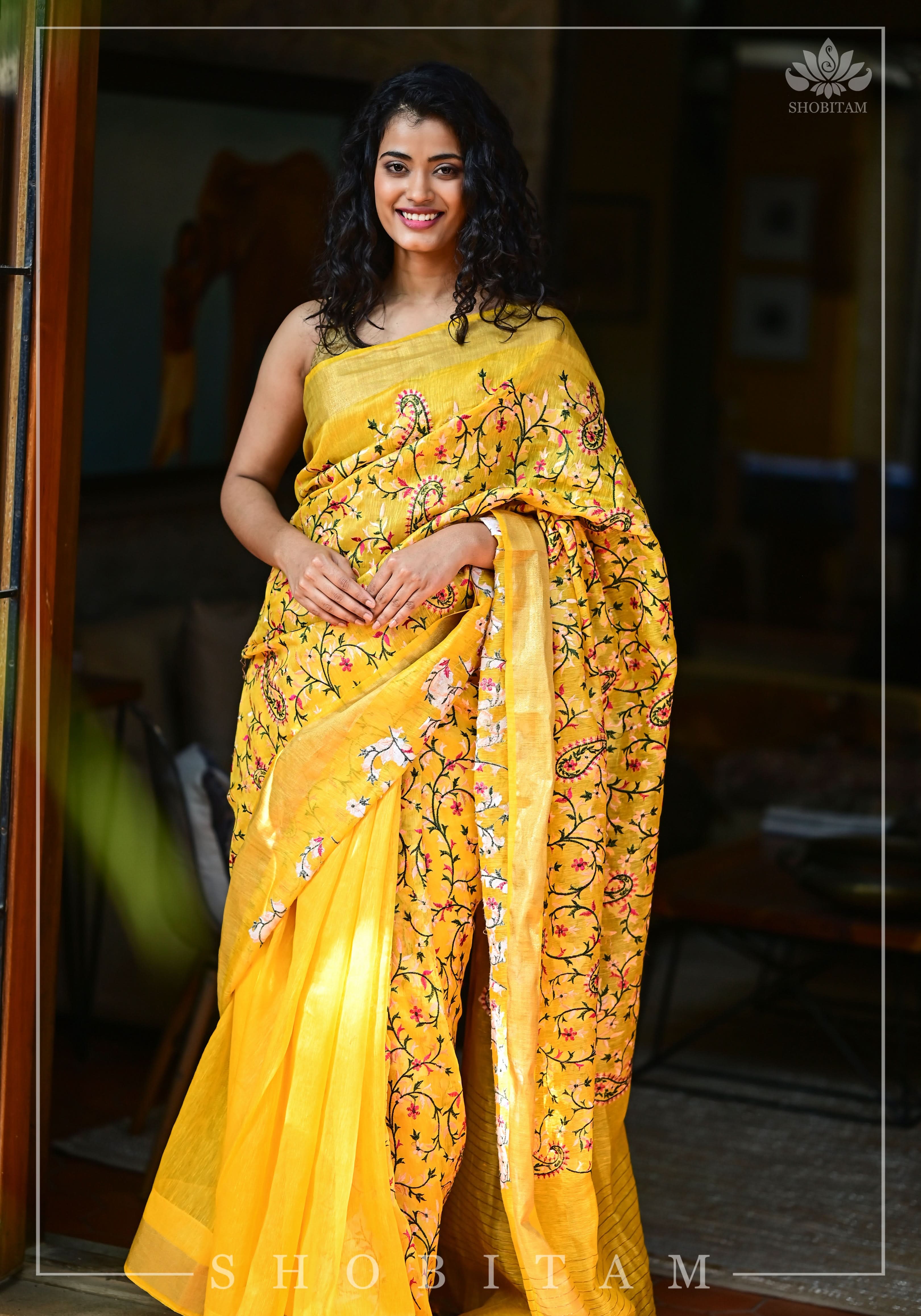 Silk Linen Saree in Yellow with Floral Half Jaal Embroidery | Shobitam