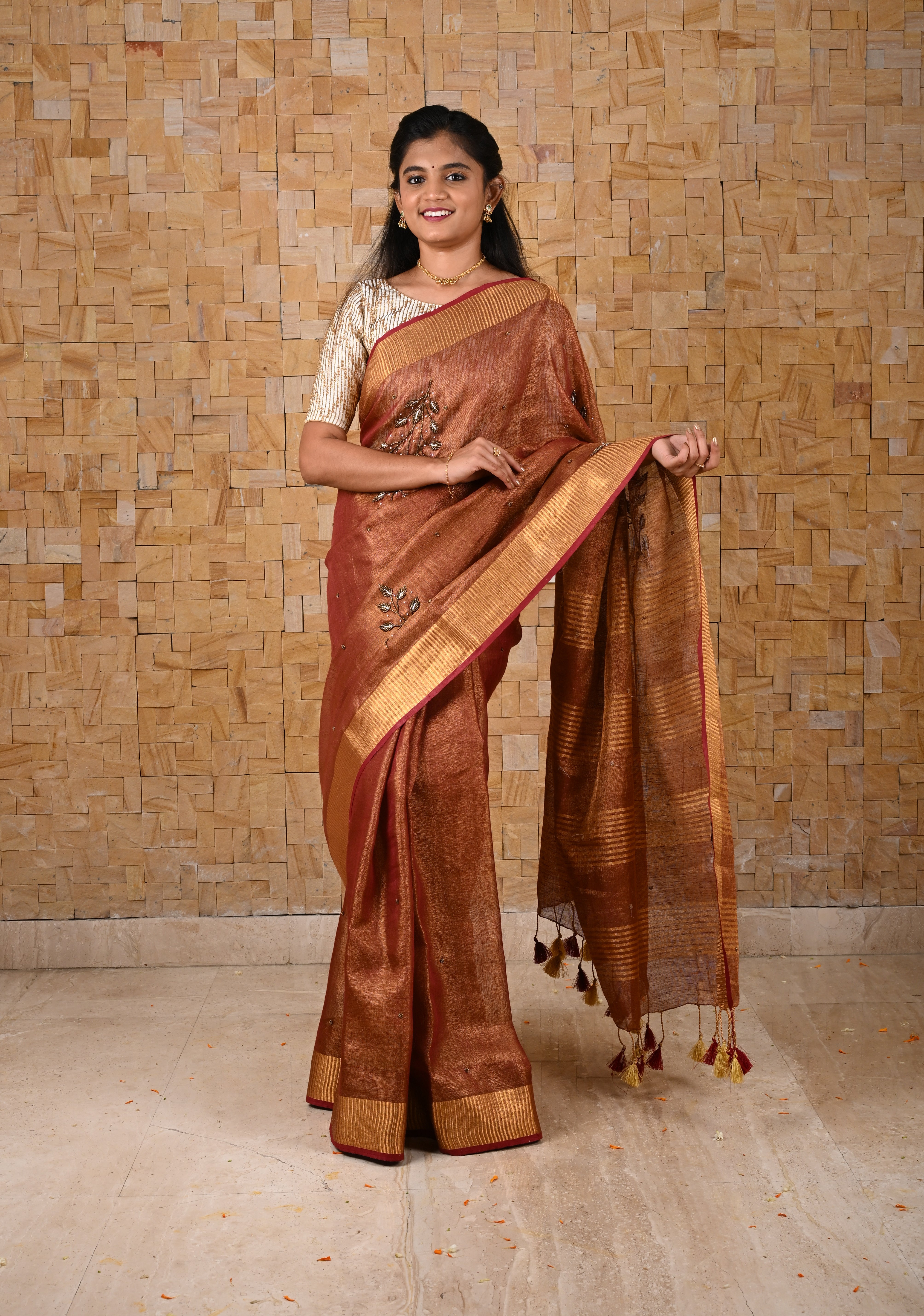 Golden Tissue Linen Saree in Reddish-Brown with Bead Embellishments | Shobitam