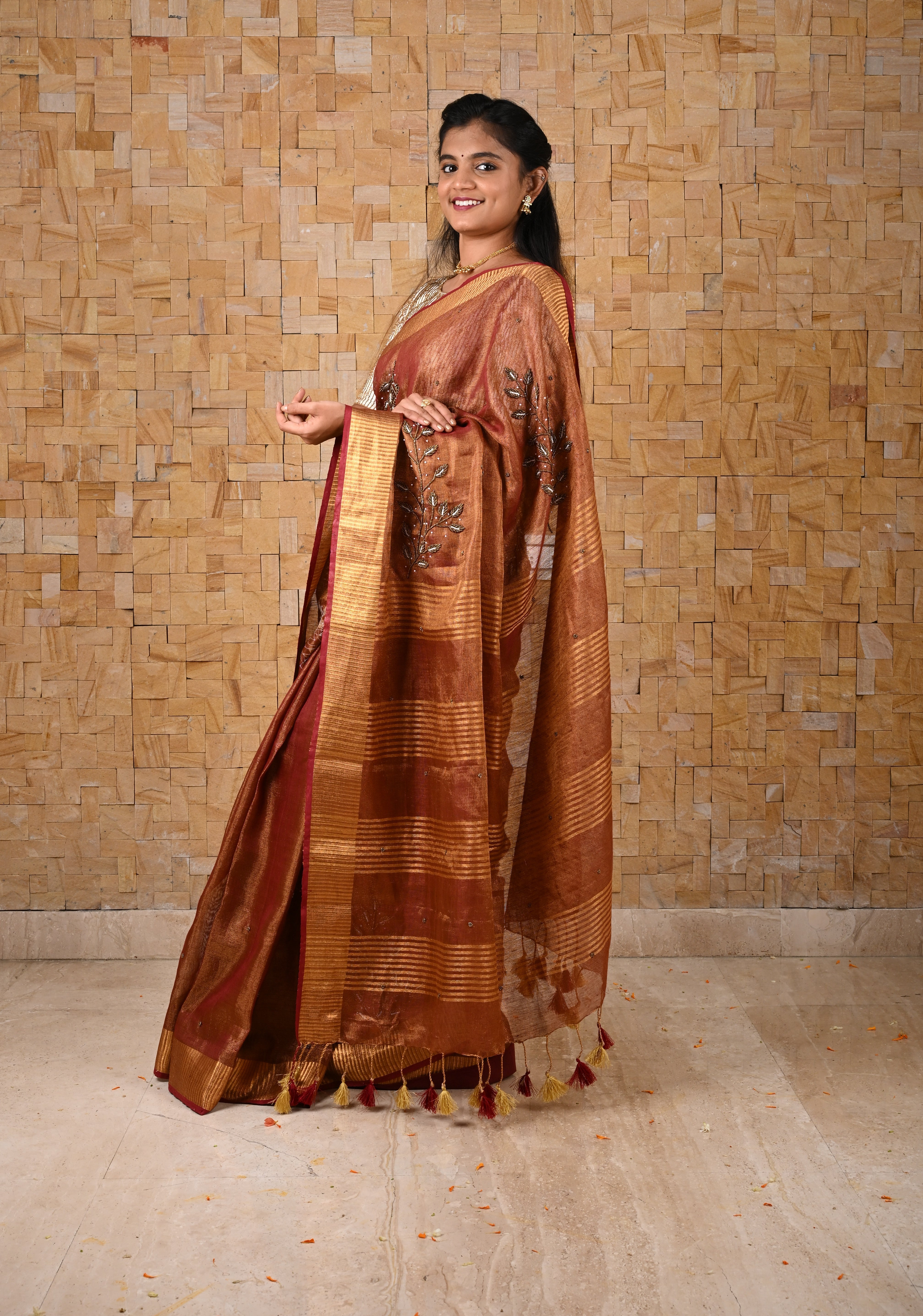 Golden Tissue Linen Saree in Reddish-Brown with Bead Embellishments | Shobitam