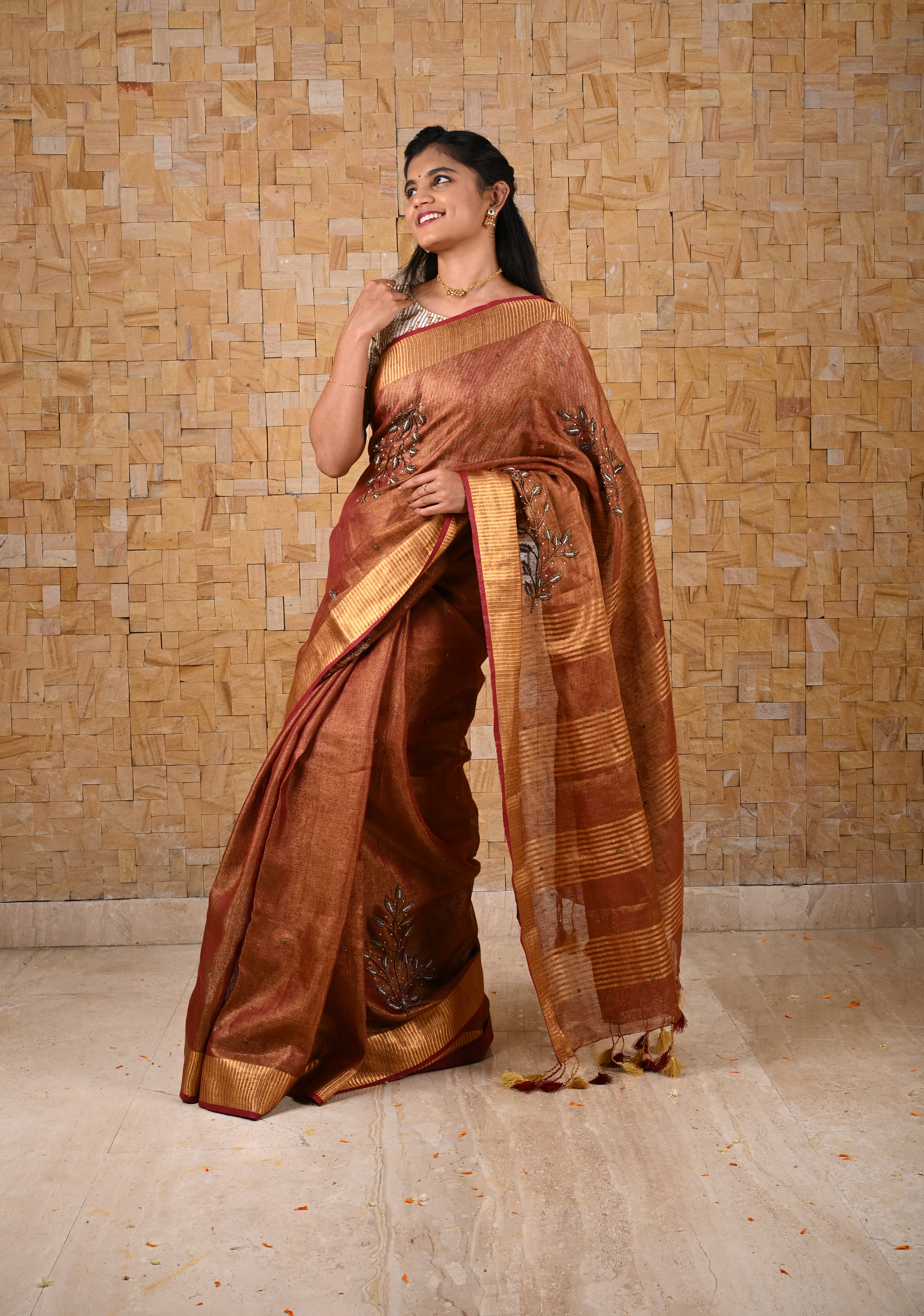 Golden Tissue Linen Saree in Reddish-Brown with Bead Embellishments | Shobitam