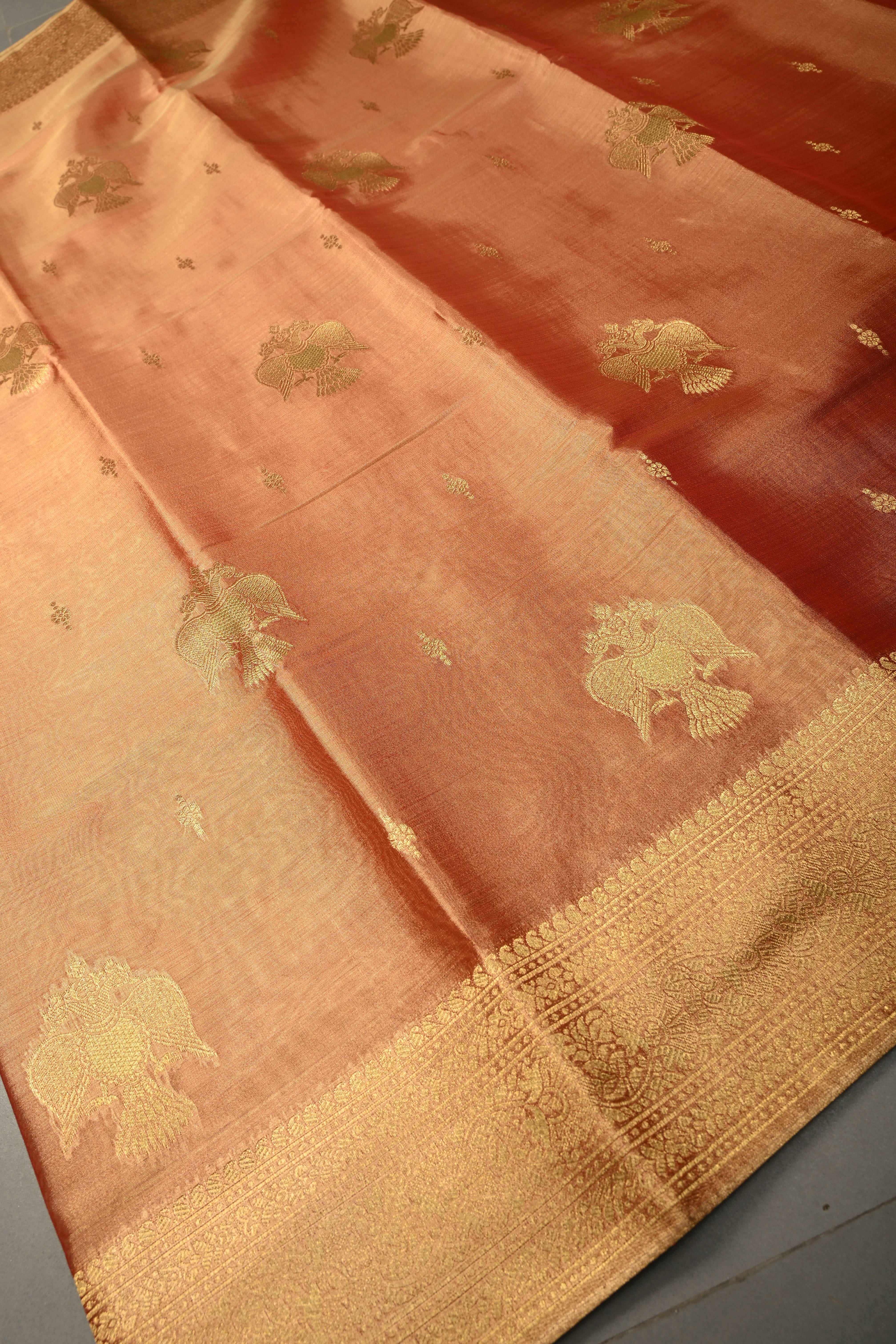 Reddish-Gold Kanchi Tissue Semi Silk Saree with Gandaberunda Zari Buttas and Zari Border | Shobitam