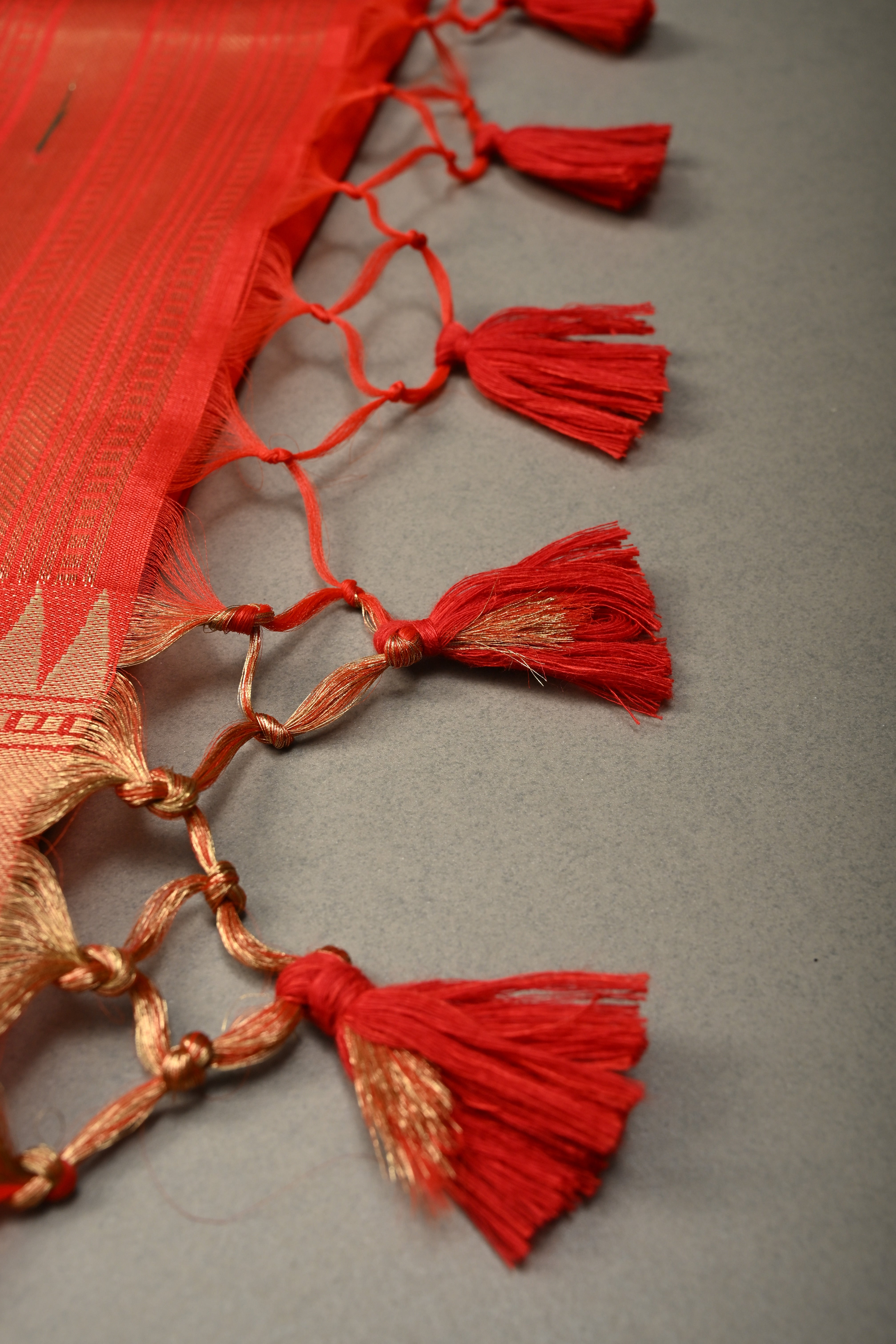 Blood Red Zari Buttas on mercerized cotton Saree with Muniya Zari Border and Meenakari Paithani Style Parrot Pallu | Shobitam