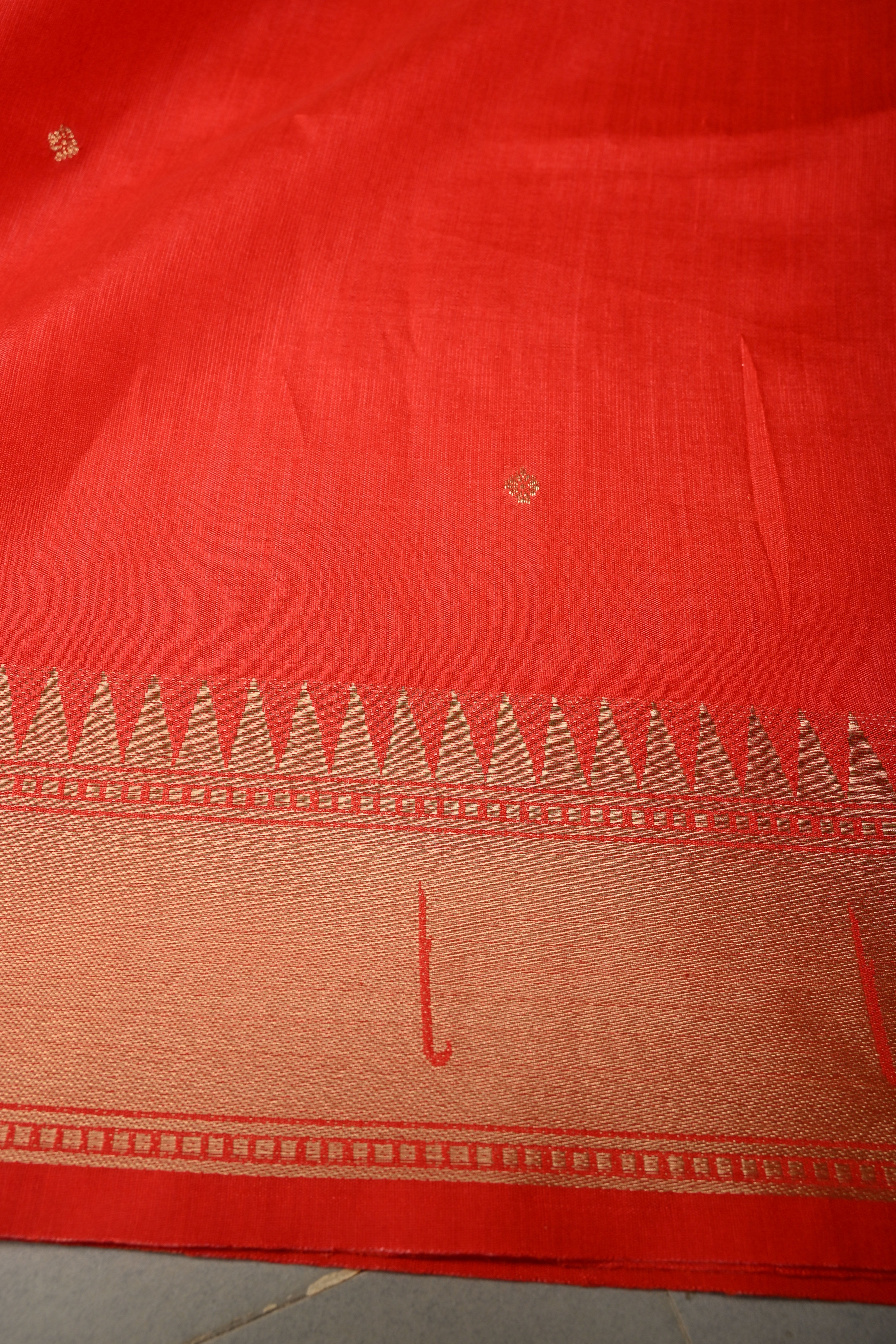 Blood Red Zari Buttas on mercerized cotton Saree with Muniya Zari Border and Meenakari Paithani Style Parrot Pallu | Shobitam