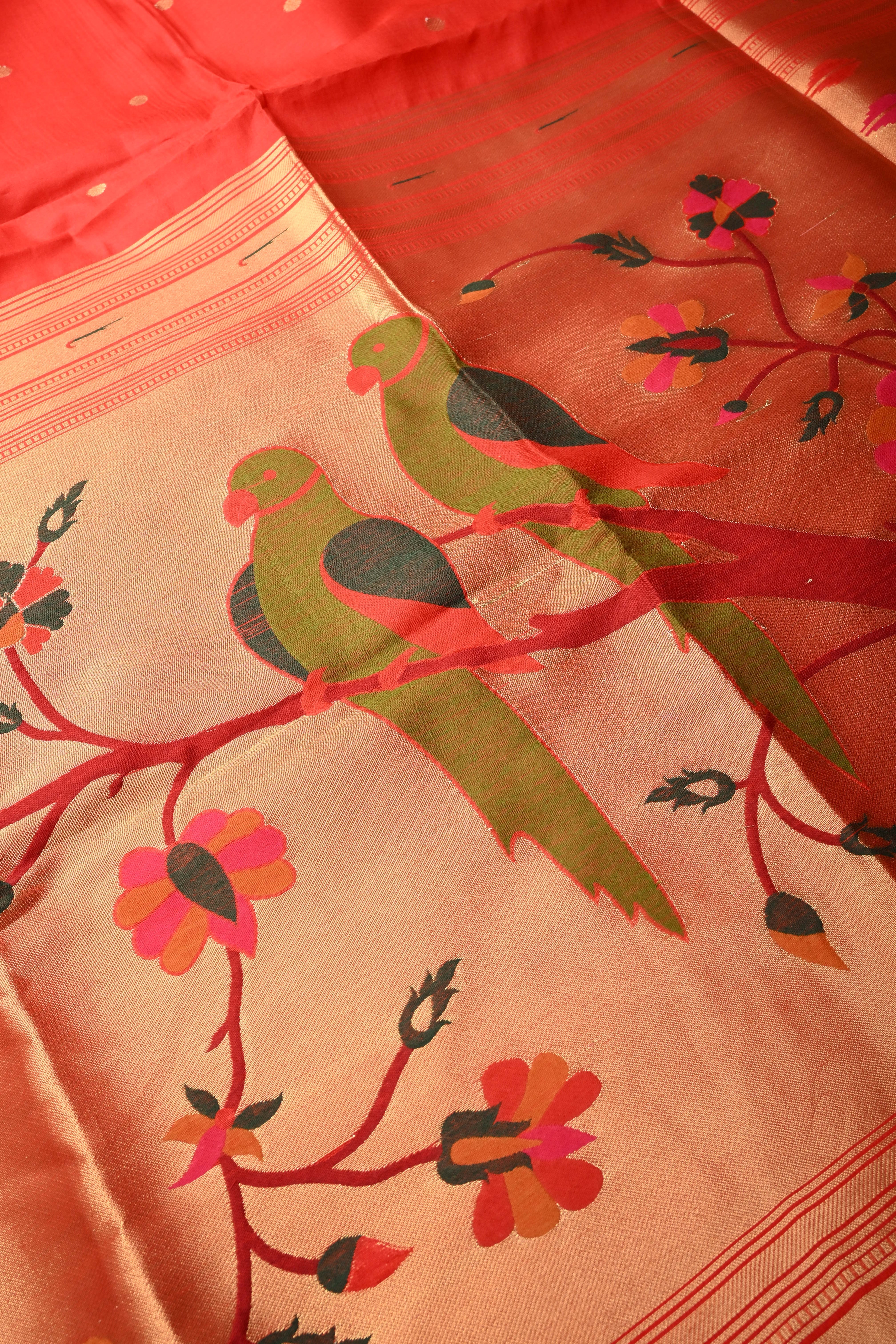 Blood Red Zari Buttas on mercerized cotton Saree with Muniya Zari Border and Meenakari Paithani Style Parrot Pallu | Shobitam