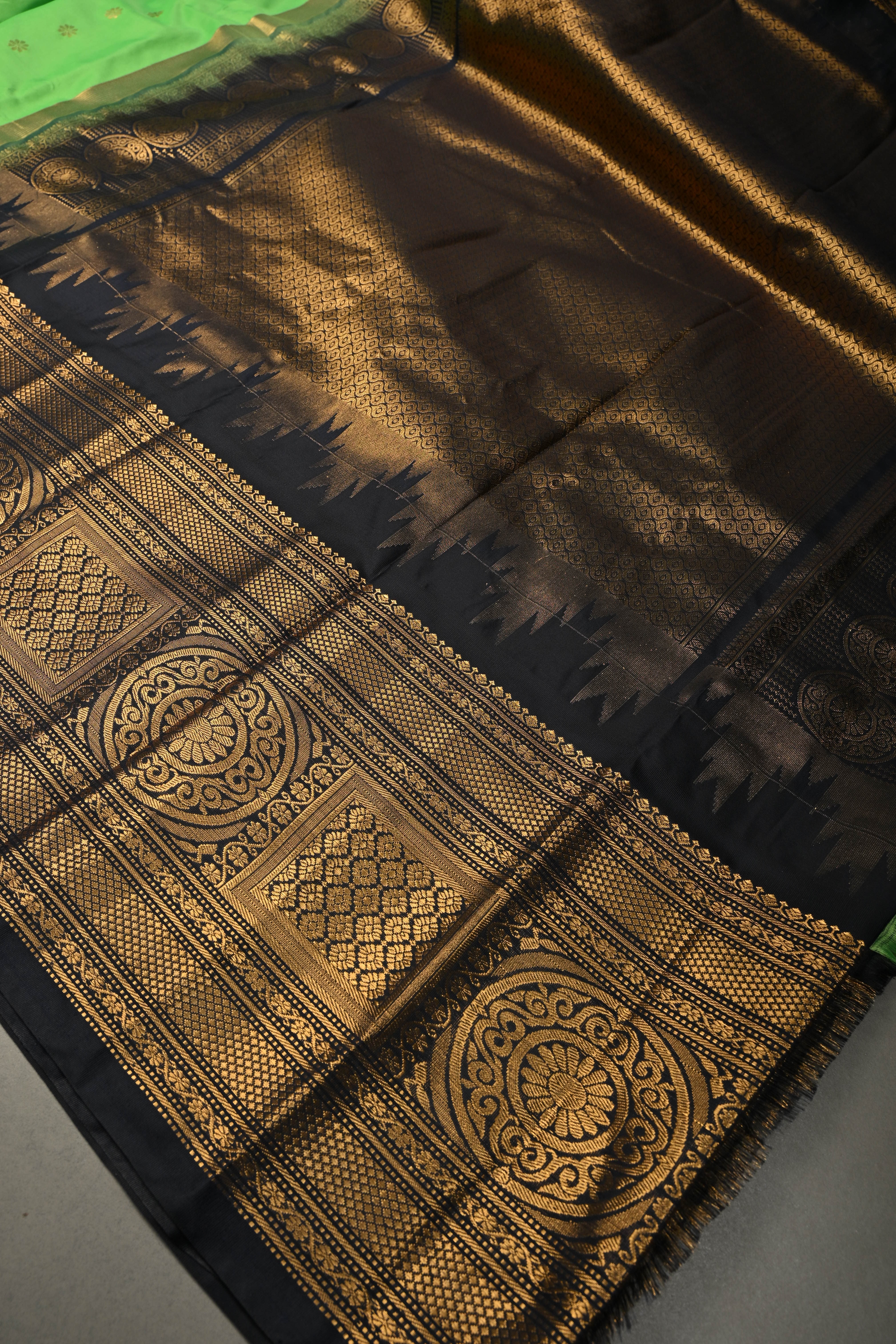 Green Semi Gadwal Silk Saree with Floral Zari Buttas and Contrast Zari Border | Shobitam