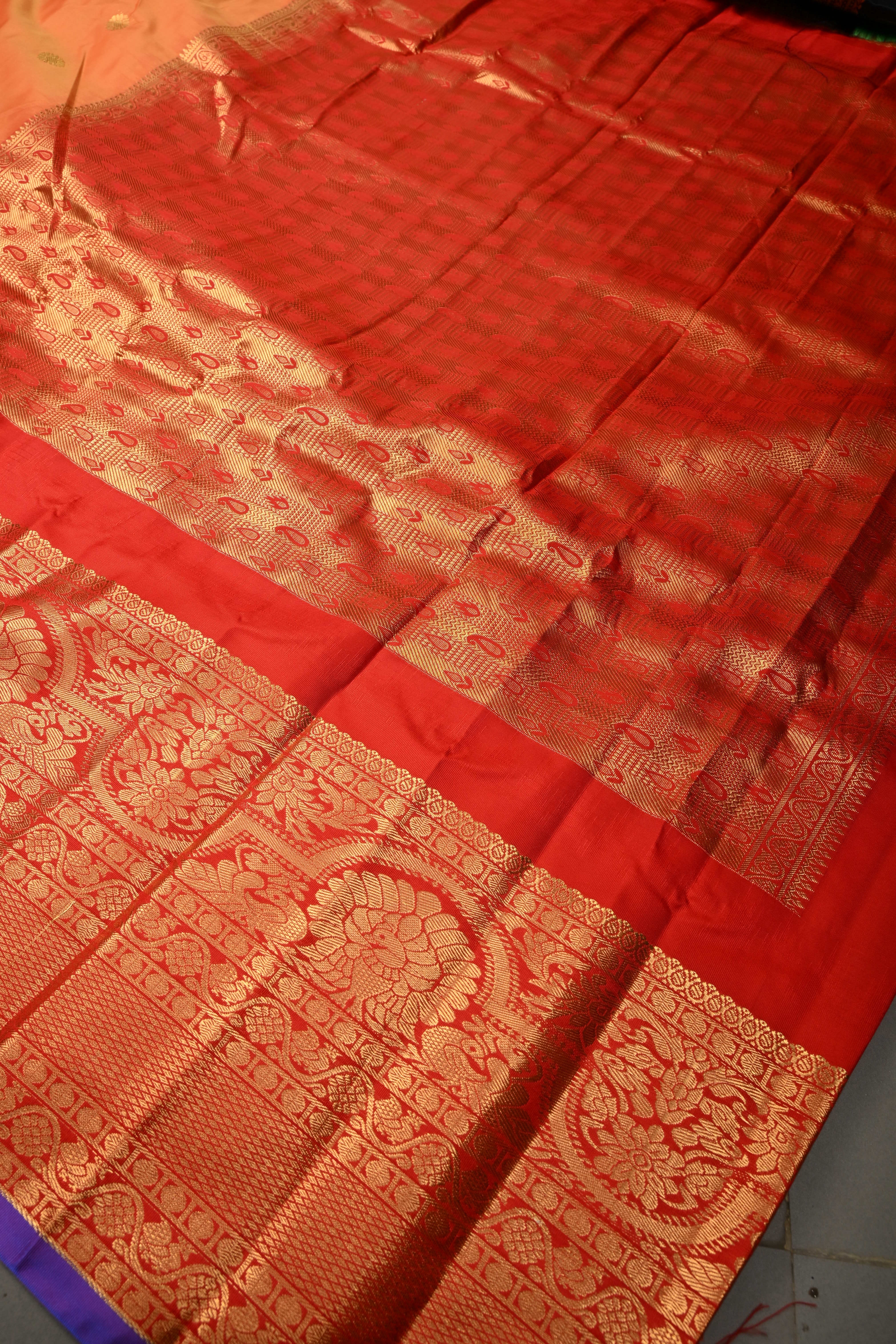 Orange Semi Gadwal Silk Saree with Floral Zari Buttas and Contrast Zari Border | Shobitam