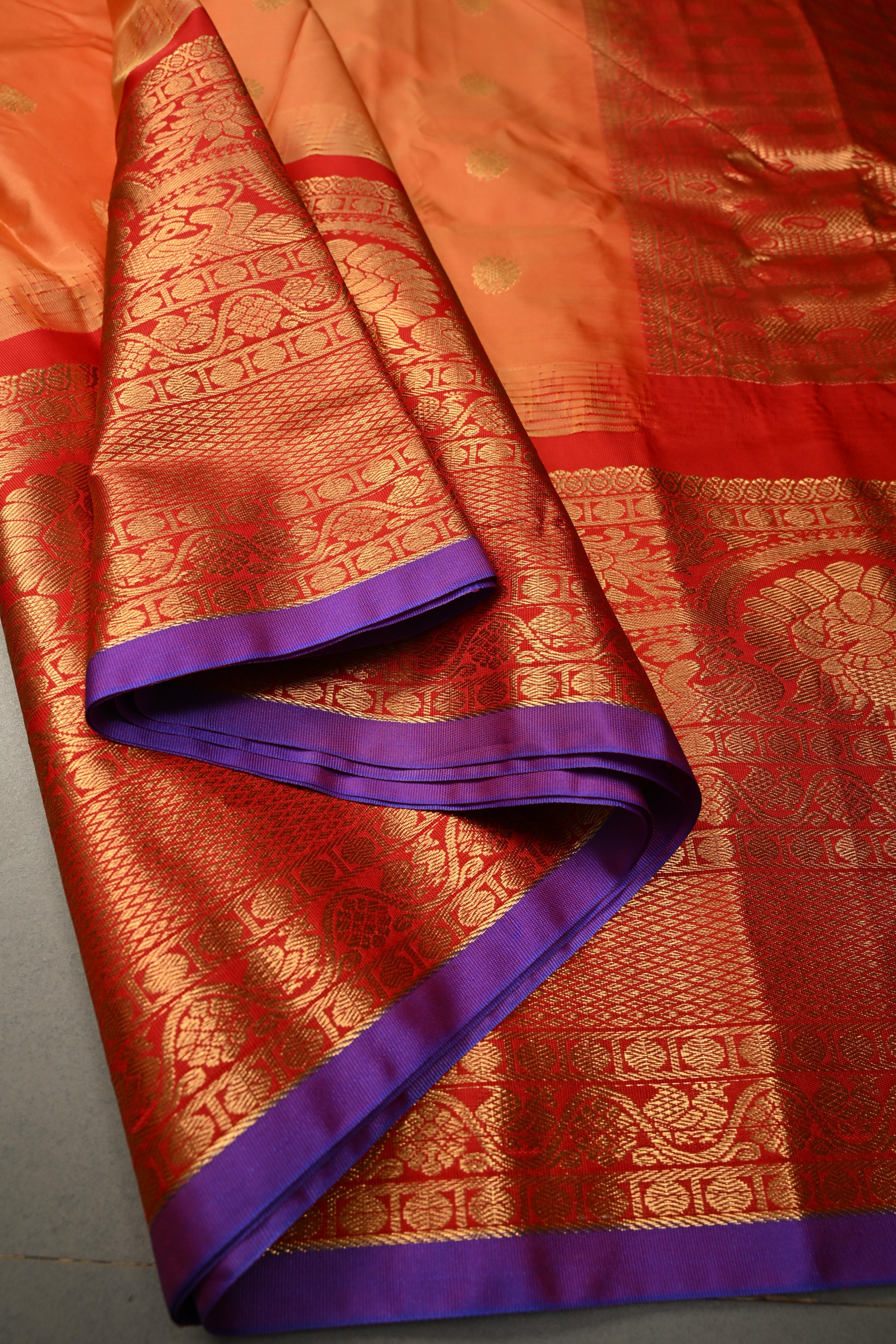 Orange Semi Gadwal Silk Saree with Floral Zari Buttas and Contrast Zari Border | Shobitam